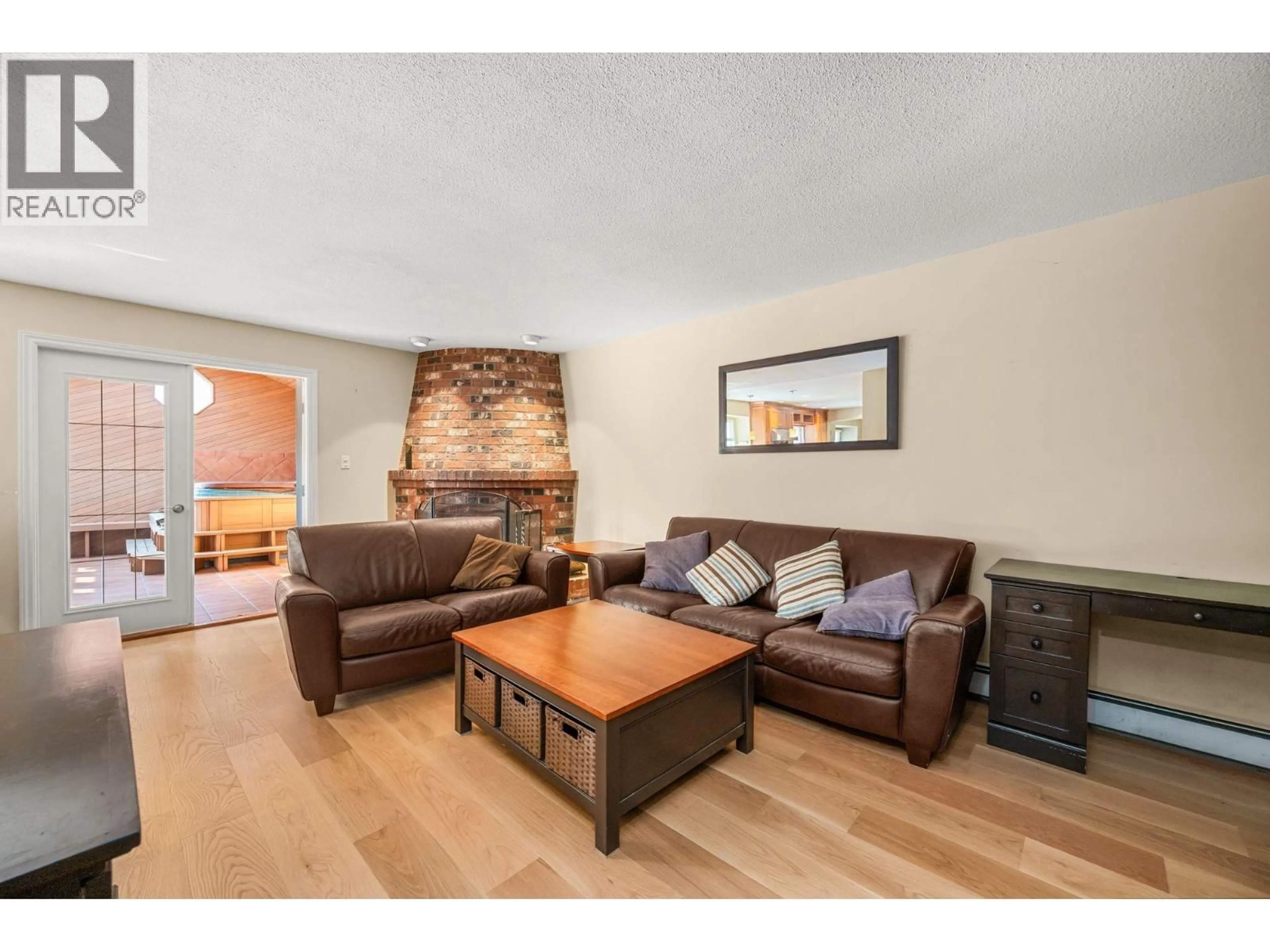 Living room with furniture, wood/laminate floor for 8711 DOULTON PLACE, Richmond British Columbia V7C5A3