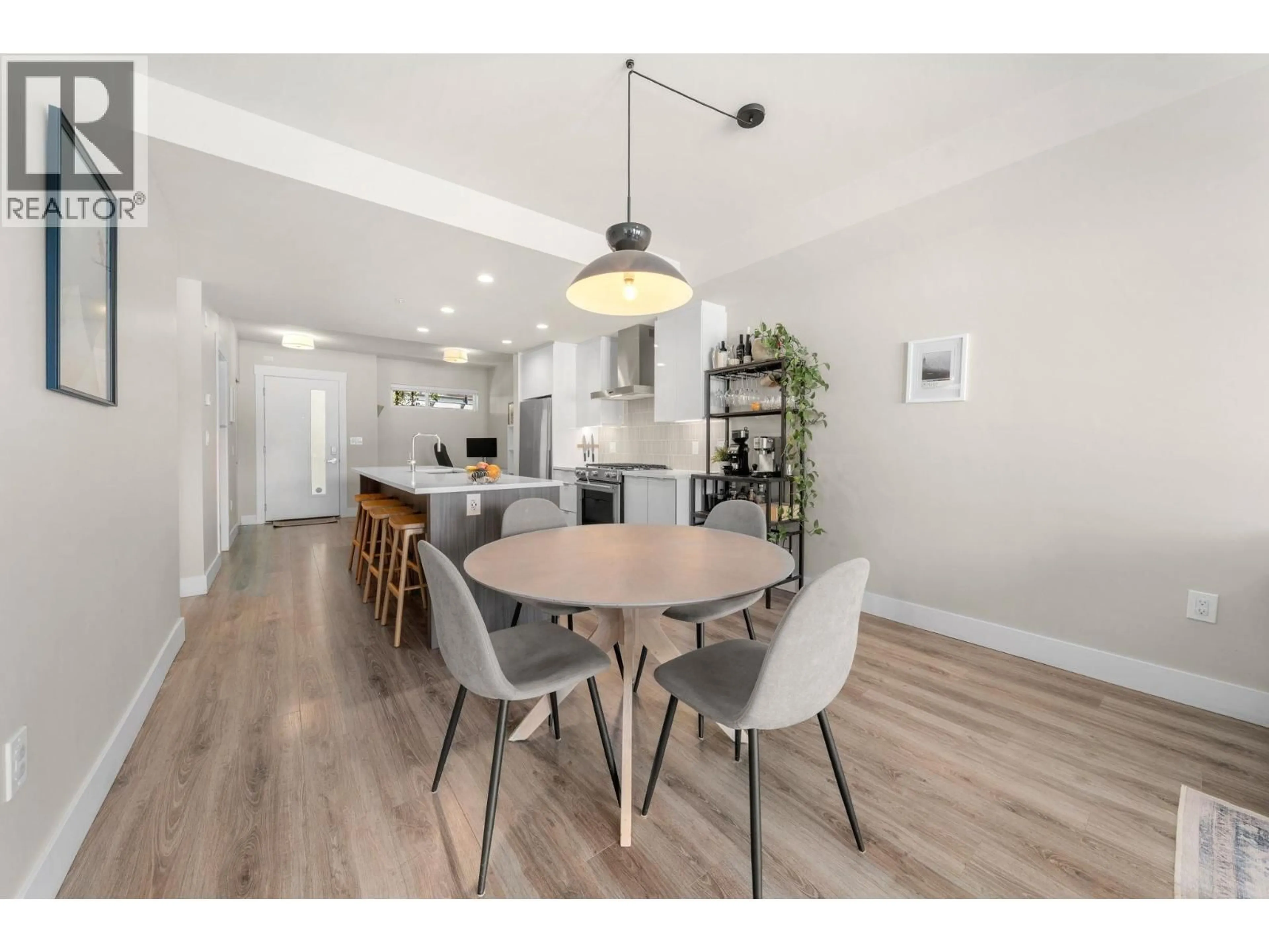 Open concept kitchen, wood/laminate floor for 302 - 1496 CHARLOTTE ROAD, North Vancouver British Columbia V7J0C9
