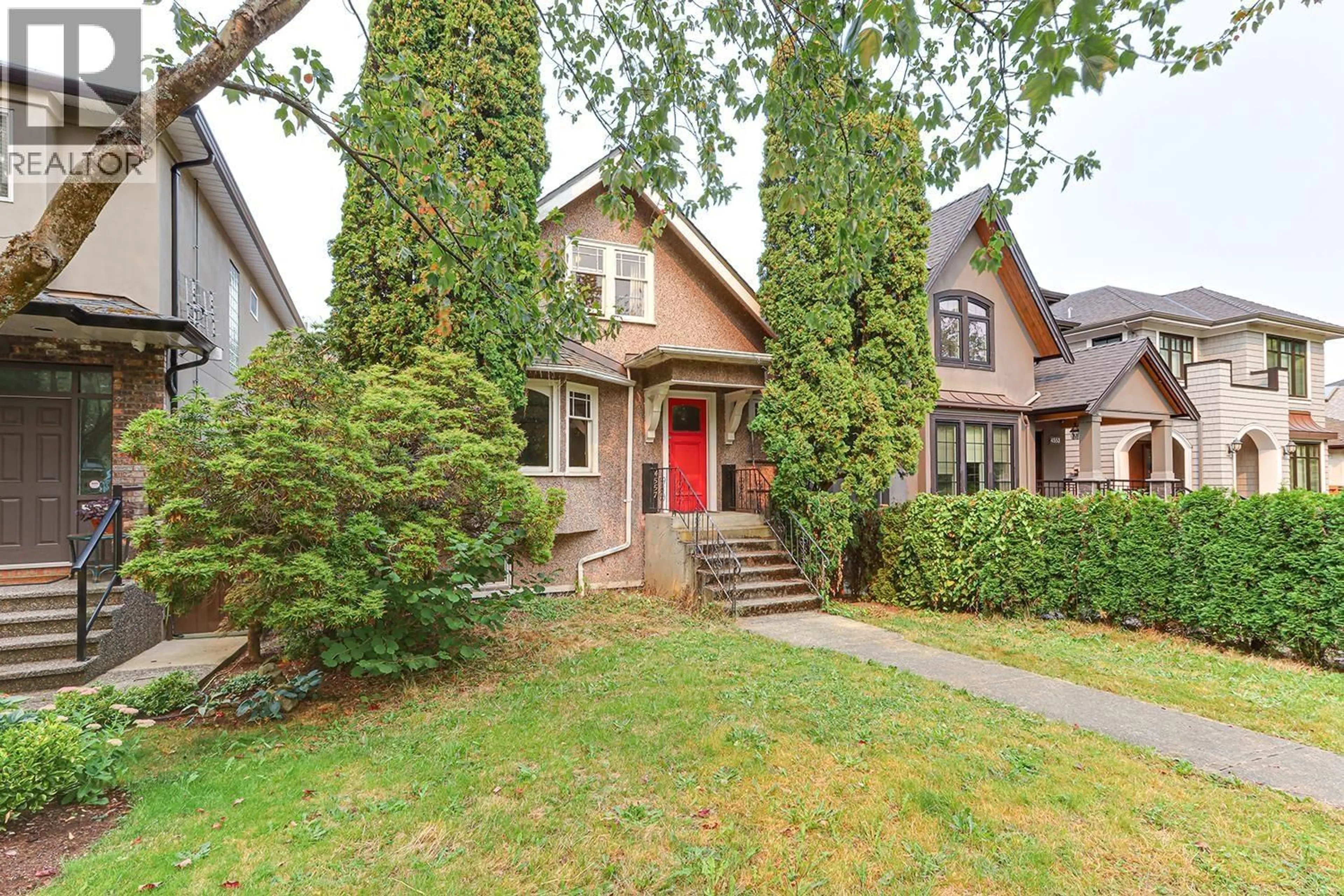Home with brick exterior material, street for 4557 14TH AVENUE, Vancouver British Columbia V6R2Y5