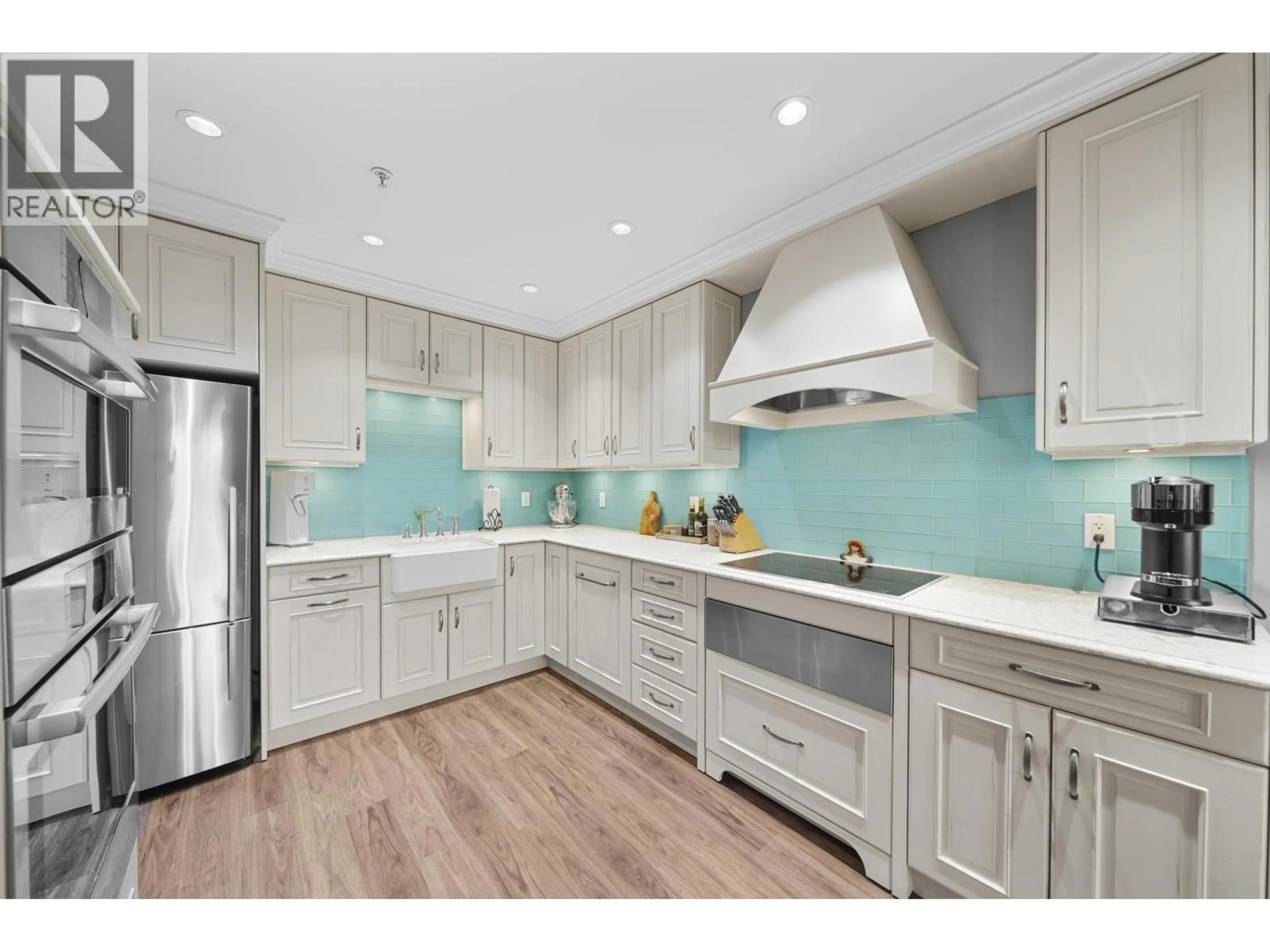 Open concept kitchen, ceramic/tile floor for 1 - 222 5TH STREET, North Vancouver British Columbia V7L1L7