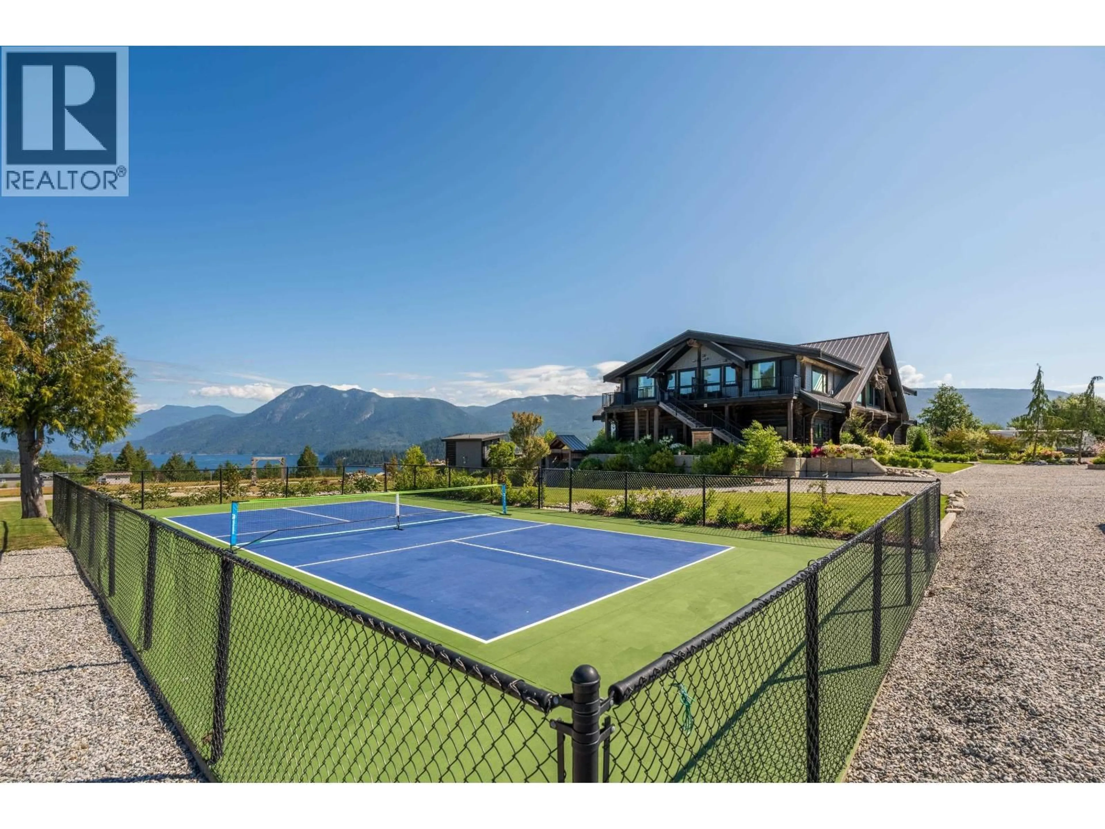 A pic from outside/outdoor area/front of a property/back of a property/a pic from drone, mountain view for 6316 CROWSTON ROAD, Sechelt British Columbia V7Z0L1