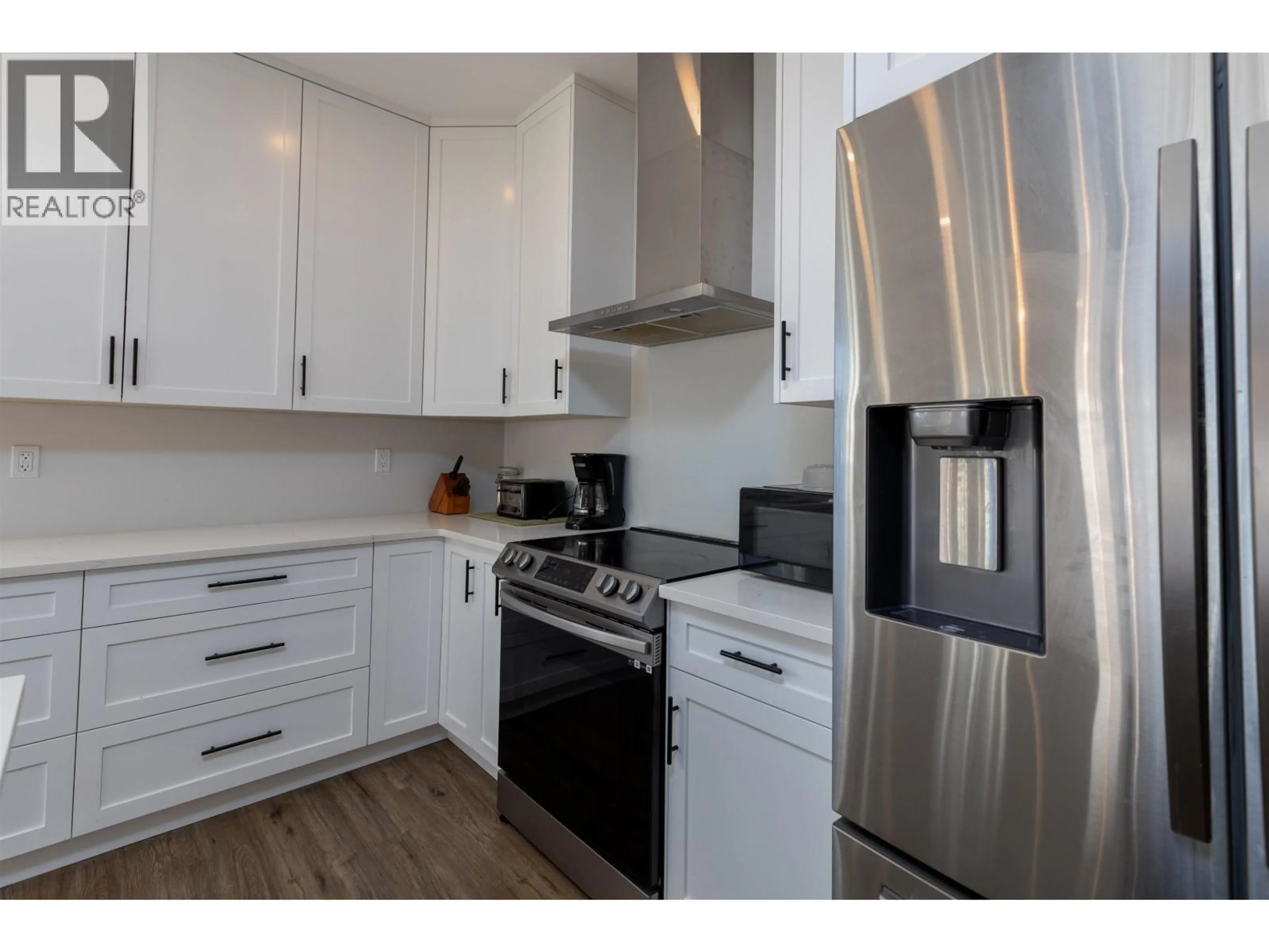 Standard kitchen, wood/laminate floor for 4946 TWEDLE AVENUE, Terrace British Columbia V8G4G7