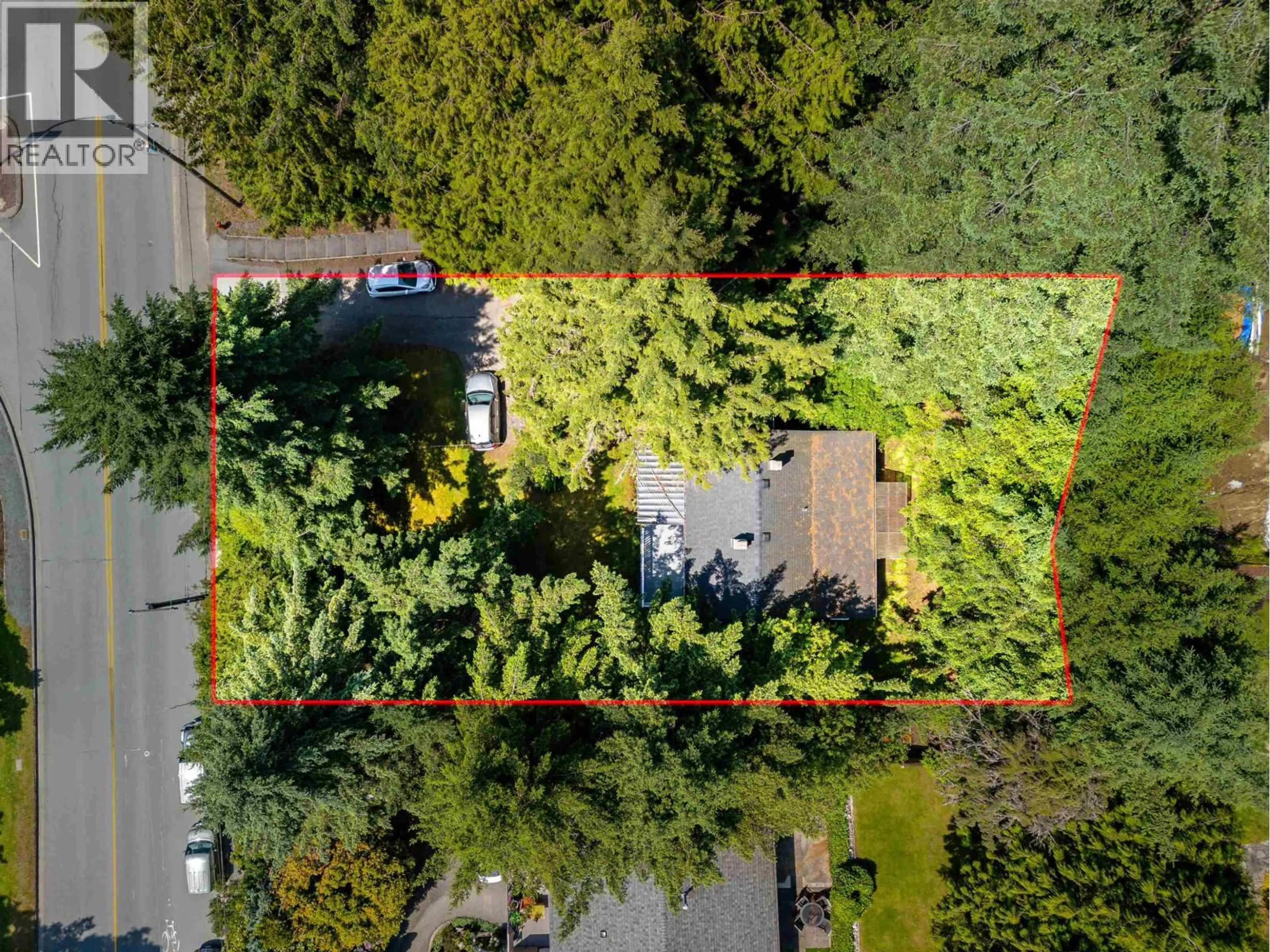 A pic from outside/outdoor area/front of a property/back of a property/a pic from drone, forest/trees view for 4150 DOLLARTON HIGHWAY, North Vancouver British Columbia V7G1A2