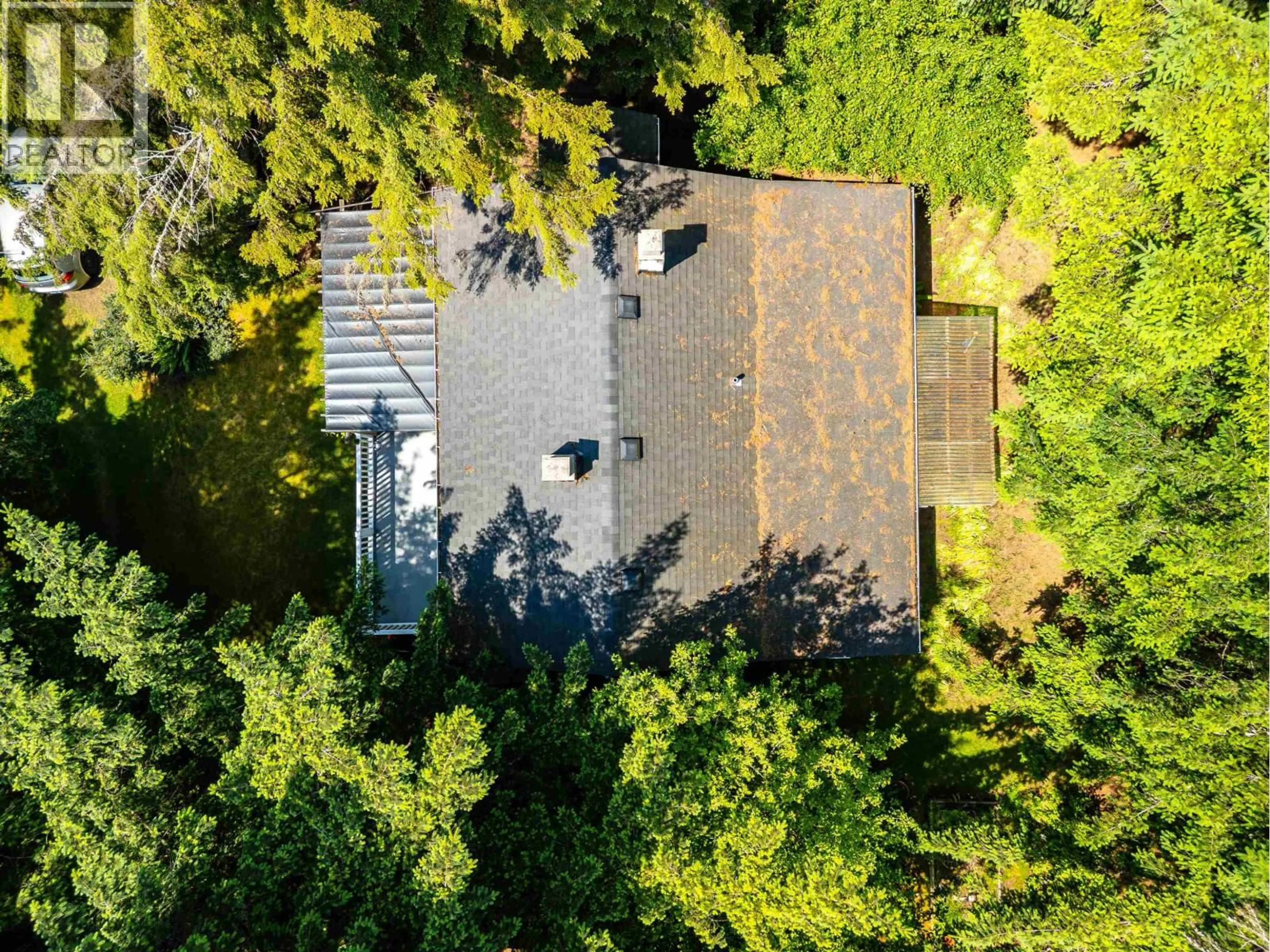 A pic from outside/outdoor area/front of a property/back of a property/a pic from drone, forest/trees view for 4150 DOLLARTON HIGHWAY, North Vancouver British Columbia V7G1A2
