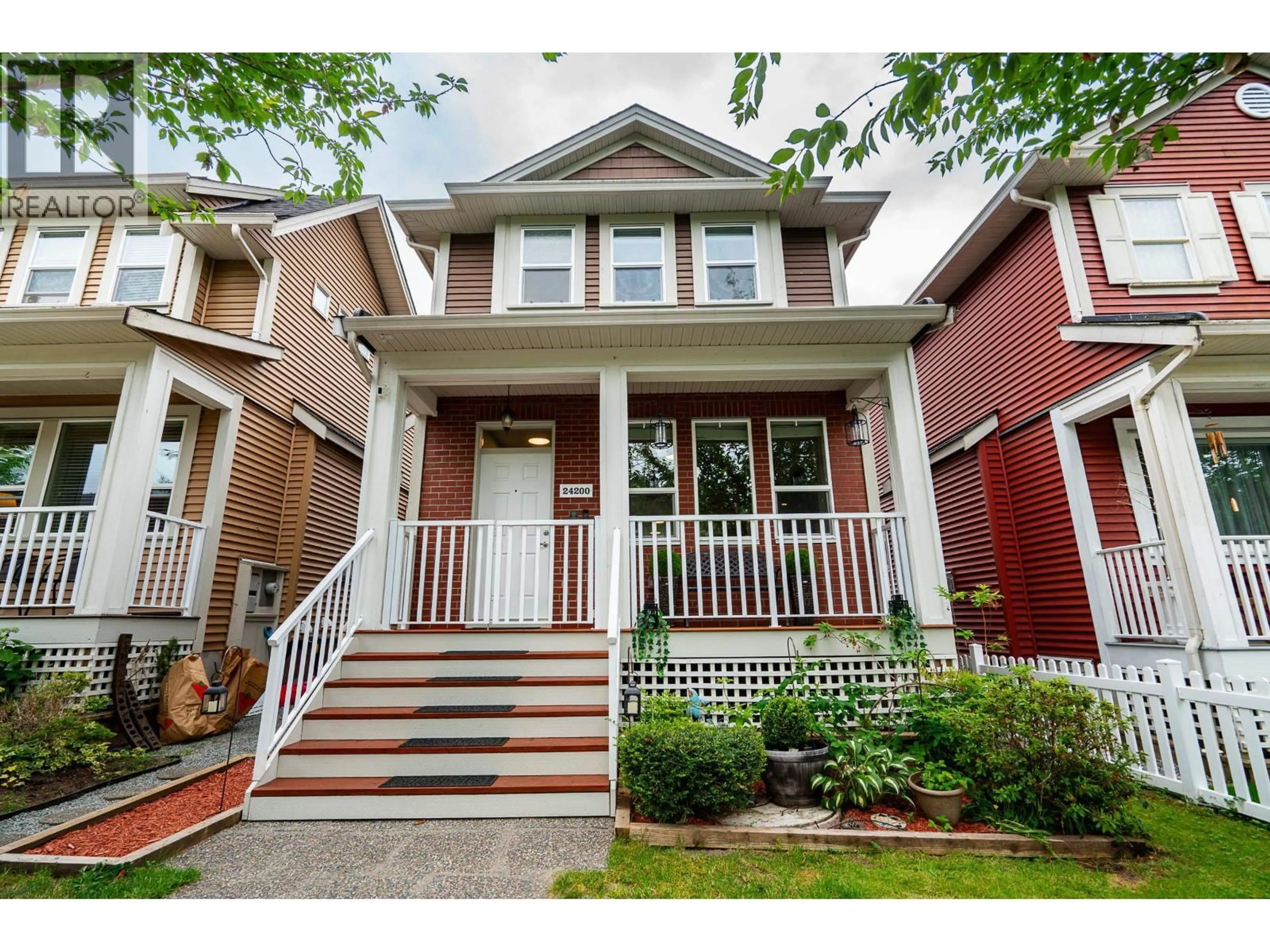 Home with vinyl exterior material, street for 24200 102A AVENUE, Maple Ridge British Columbia V2W2E4