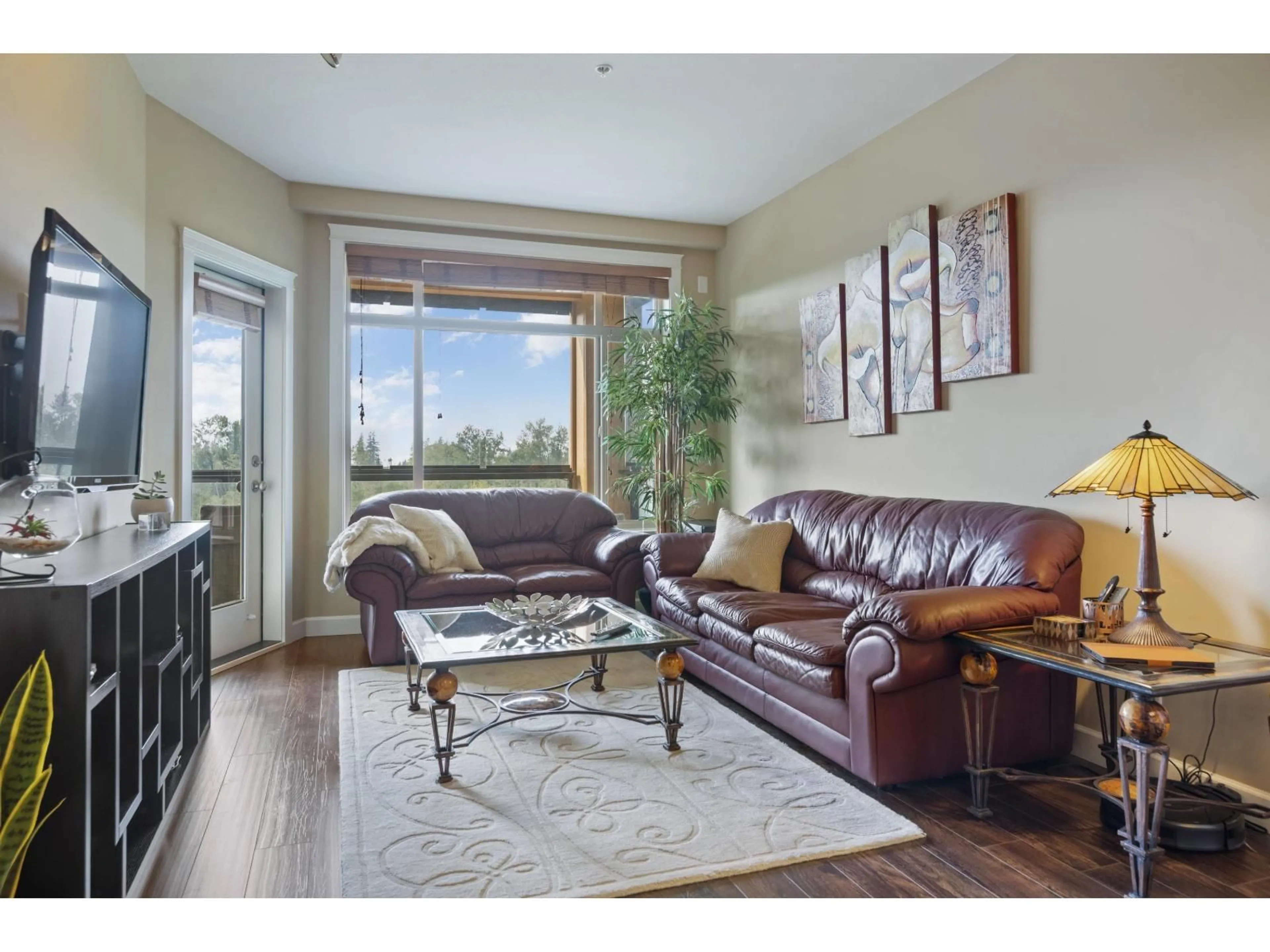 Living room with furniture, wood/laminate floor for 530 - 8067 207, Langley British Columbia V2Y0P1
