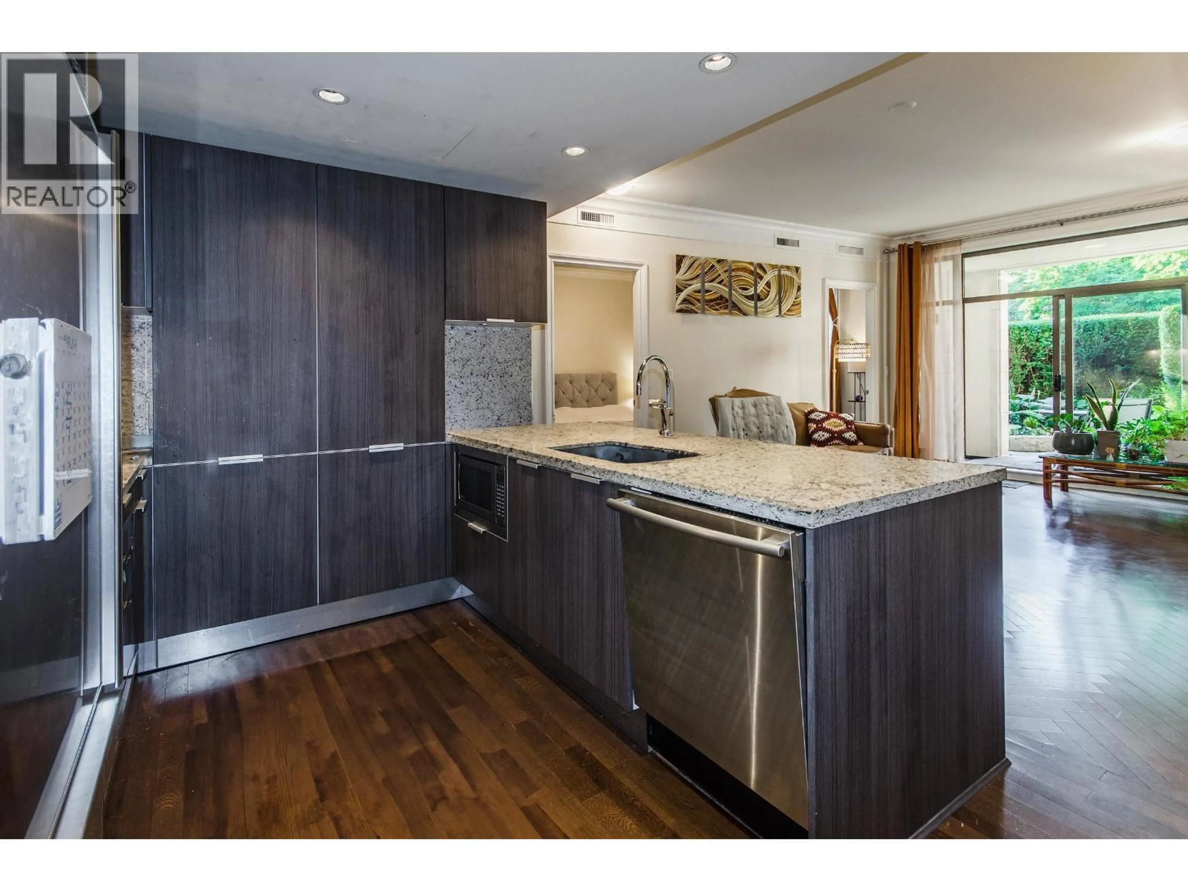 Open concept kitchen, wood/laminate floor for 103 - 540 WATERS EDGE CRESCENT, West Vancouver British Columbia V7T0A2