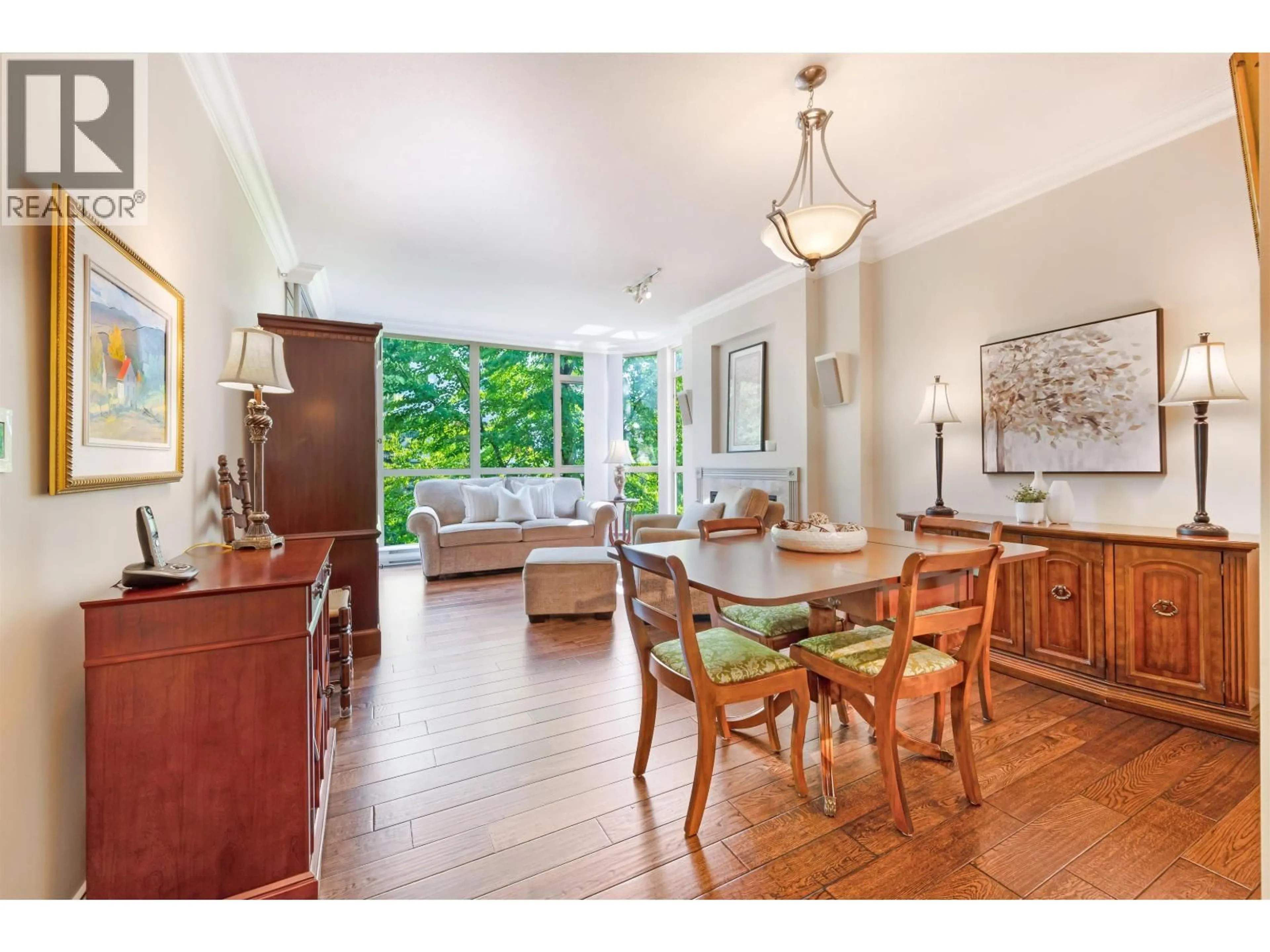 Dining room, wood/laminate floor for 302 - 160 KEITH ROAD, North Vancouver British Columbia V7M3M2