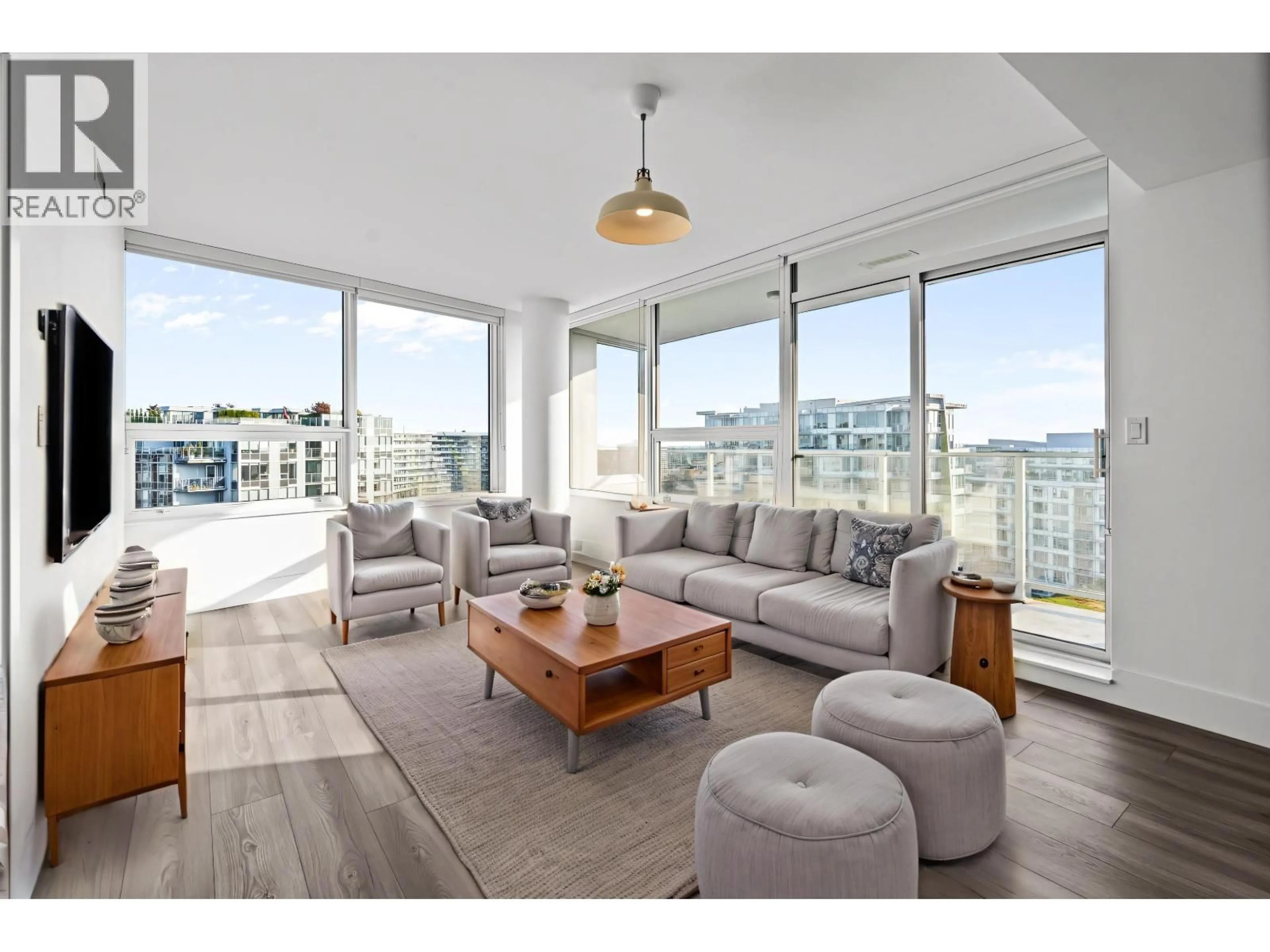 Living room with furniture, wood/laminate floor for 1403 - 5508 HOLLYBRIDGE WAY, Richmond British Columbia V7C0C7