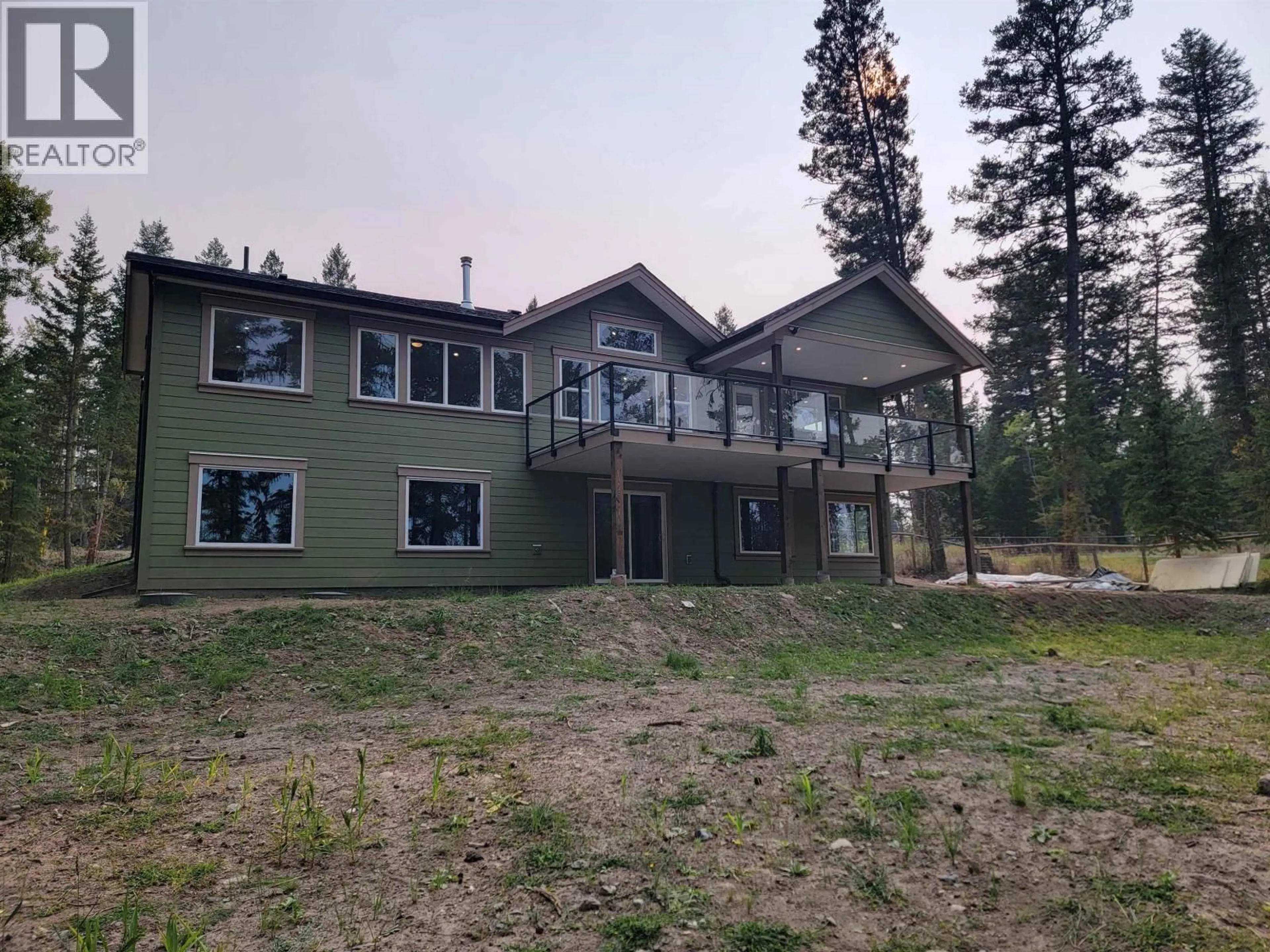 A pic from outside/outdoor area/front of a property/back of a property/a pic from drone, unknown for 5343 ANNAHAM CRESCENT, 108 Mile Ranch British Columbia V0K2Z0
