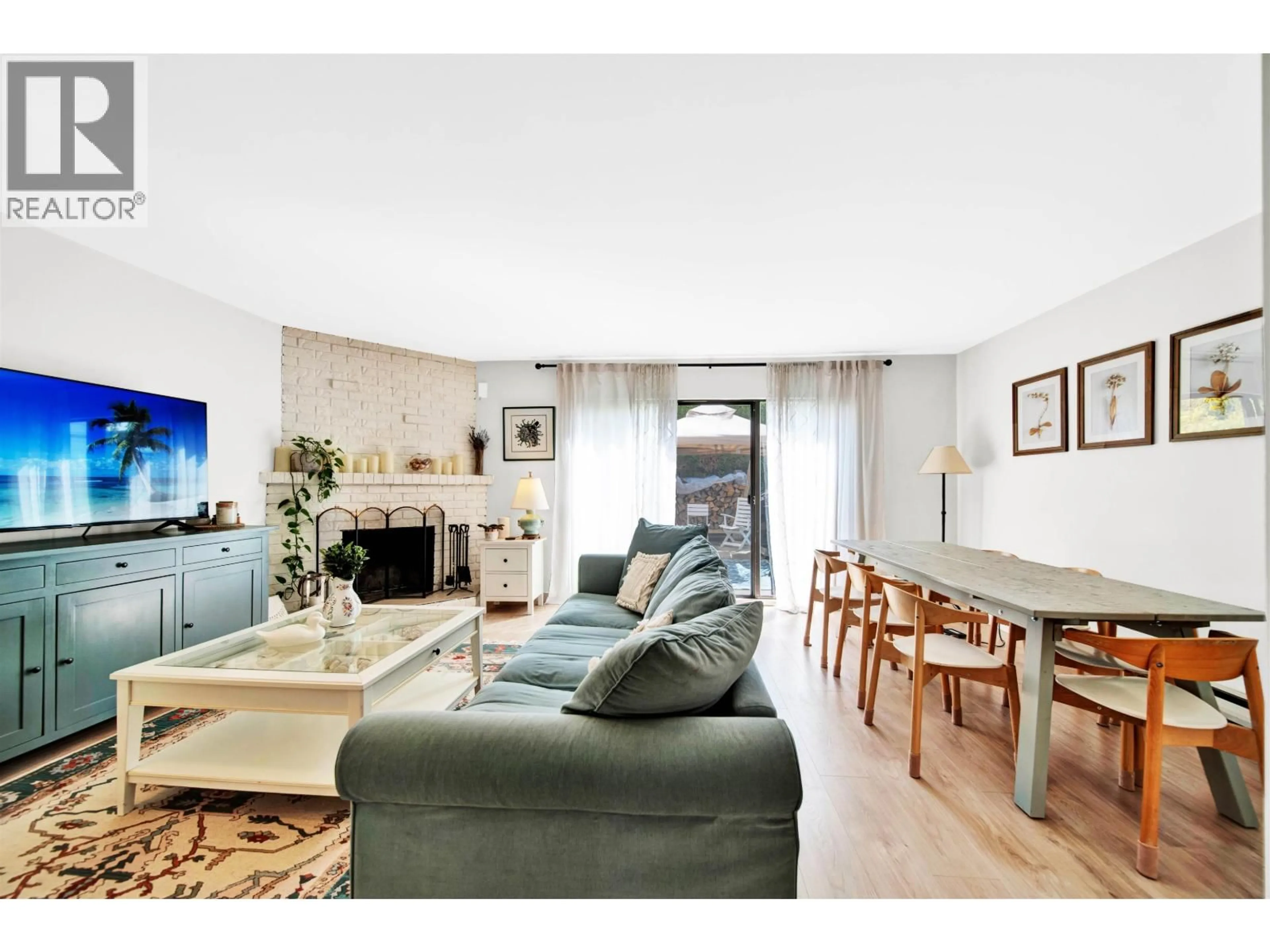 Living room with furniture, wood/laminate floor for 21 - 10680 SPRINGMONT DRIVE, Richmond British Columbia V7E1W1