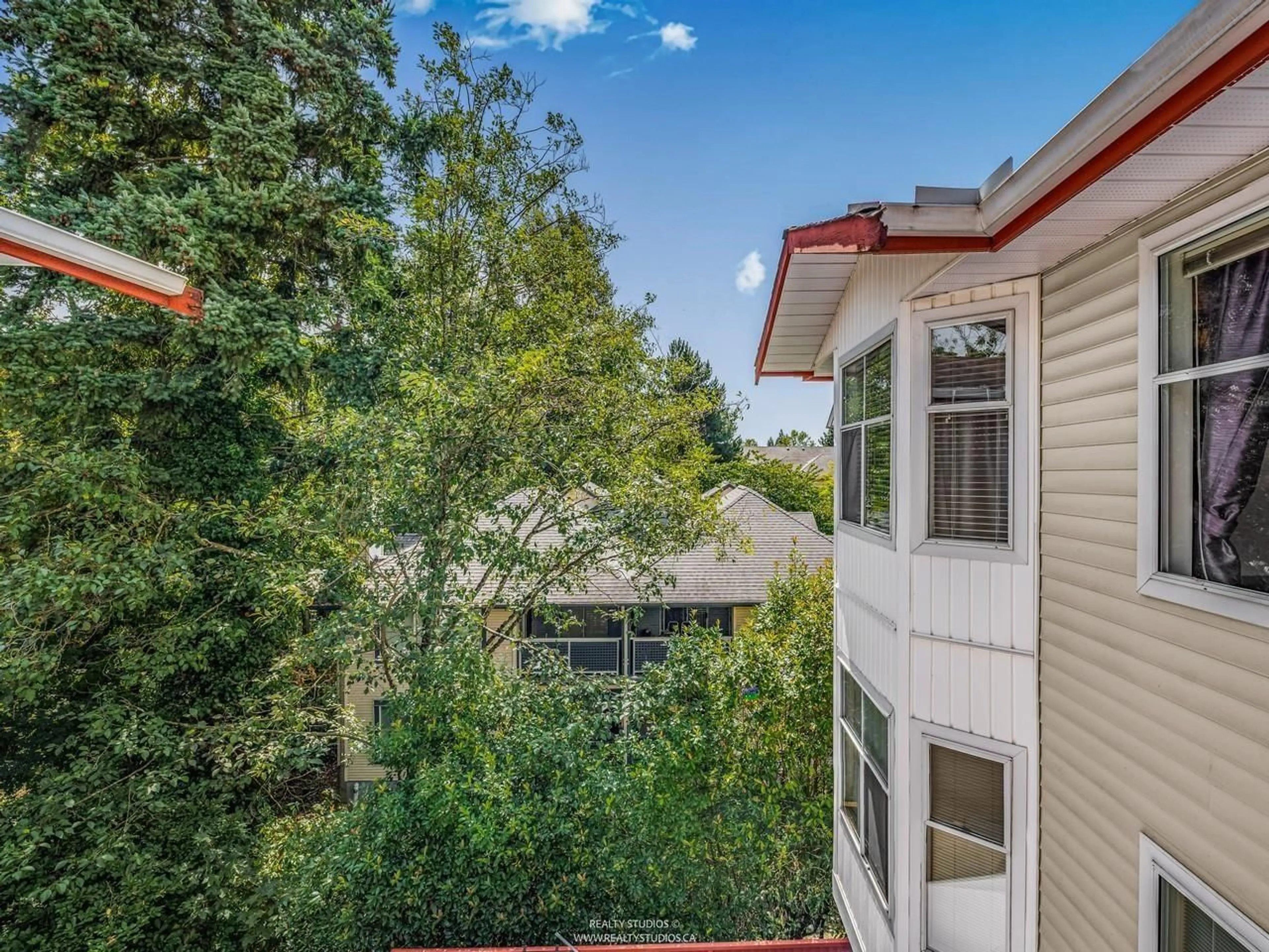 A pic from outside/outdoor area/front of a property/back of a property/a pic from drone, city buildings view from balcony for 308 - 5776 200, Langley British Columbia V3A1M8
