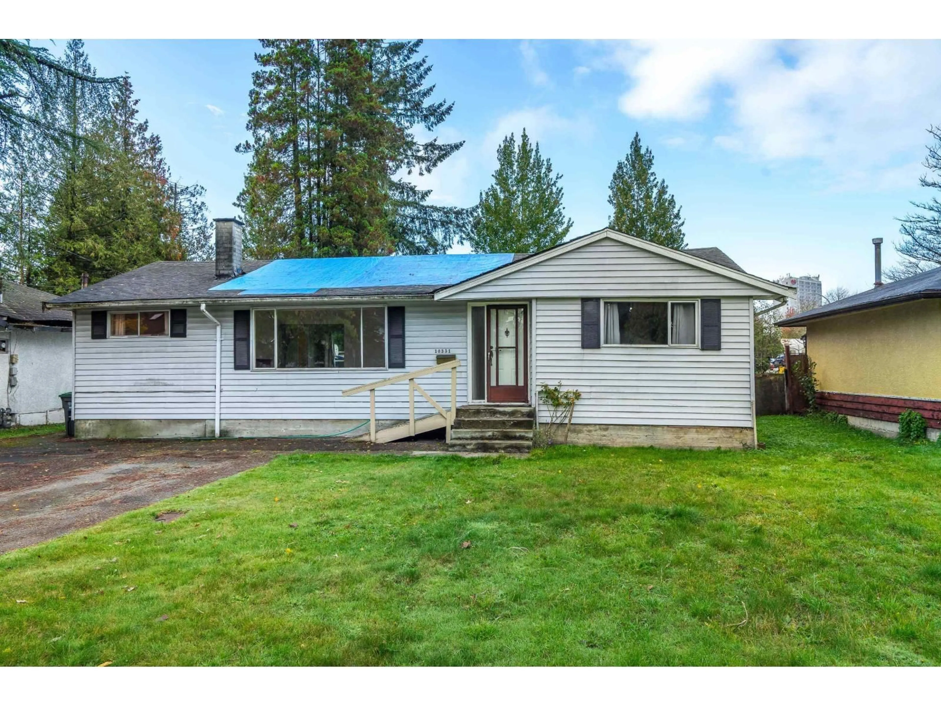 Home with vinyl exterior material, street for 10331 155A, Surrey British Columbia V3R4K4