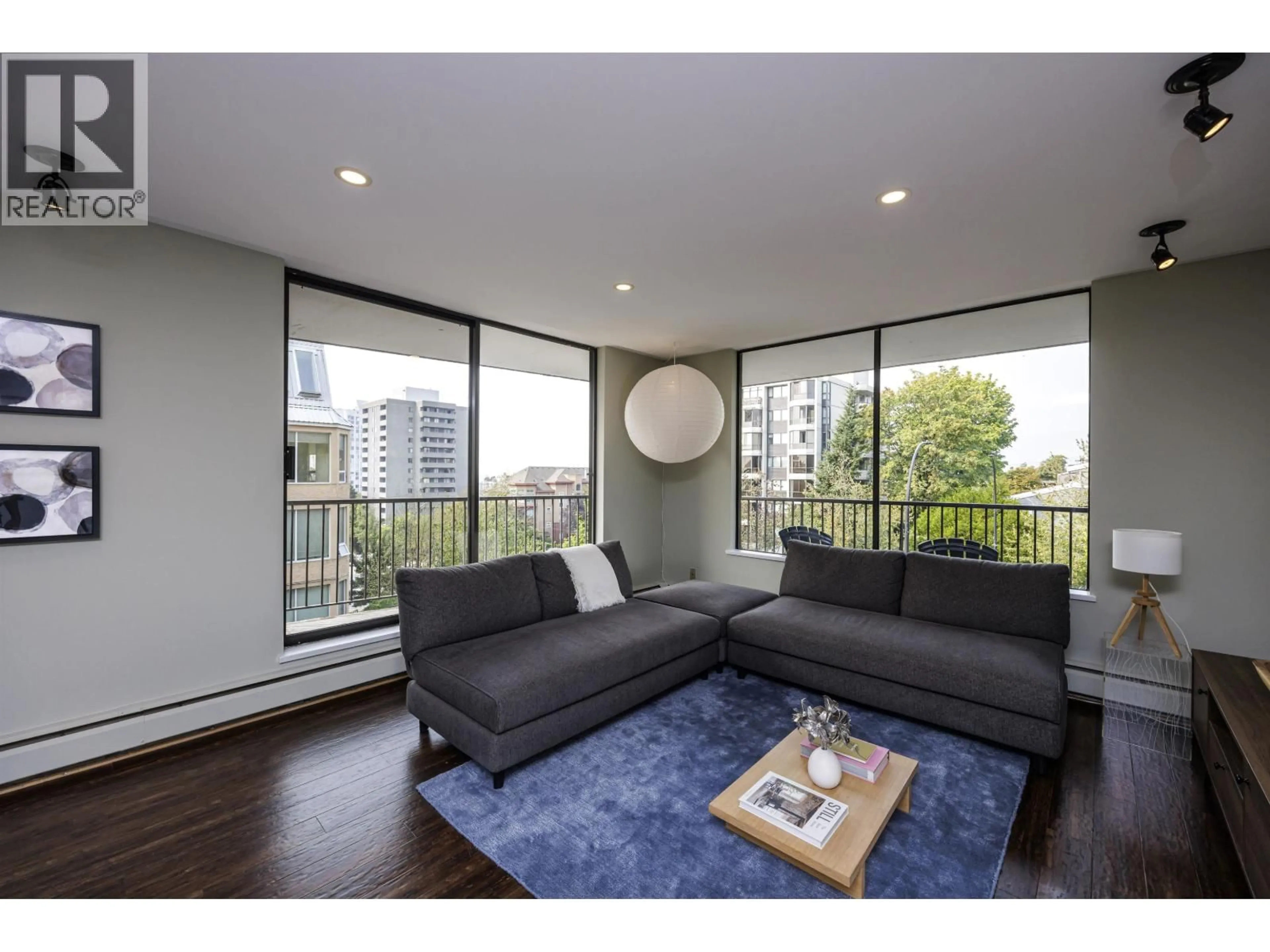 Living room with furniture, wood/laminate floor for 302 - 540 LONSDALE AVENUE, North Vancouver British Columbia V7M2G7