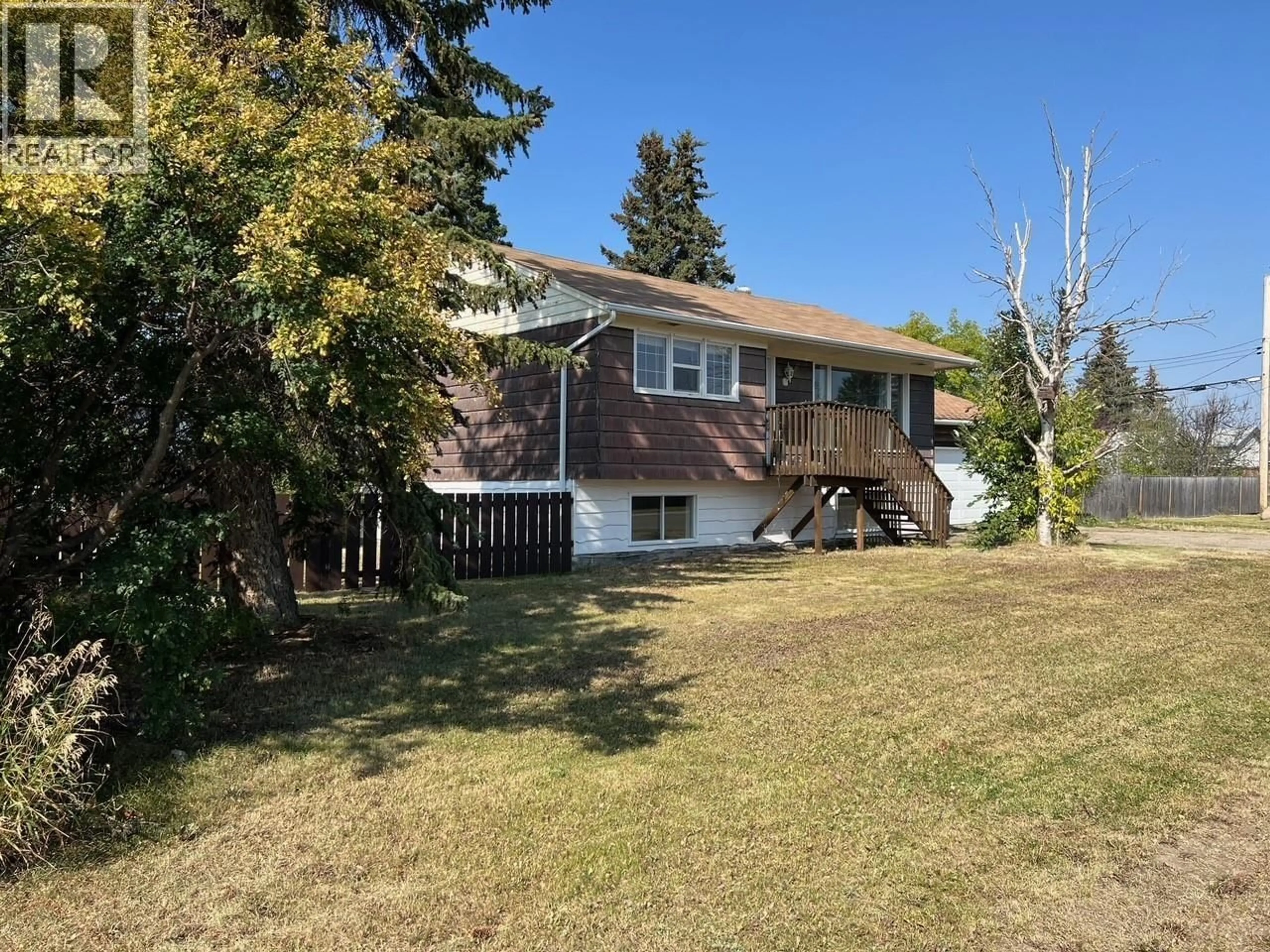A pic from outside/outdoor area/front of a property/back of a property/a pic from drone, street for 9704 81 STREET, Fort St. John British Columbia V1J3C3