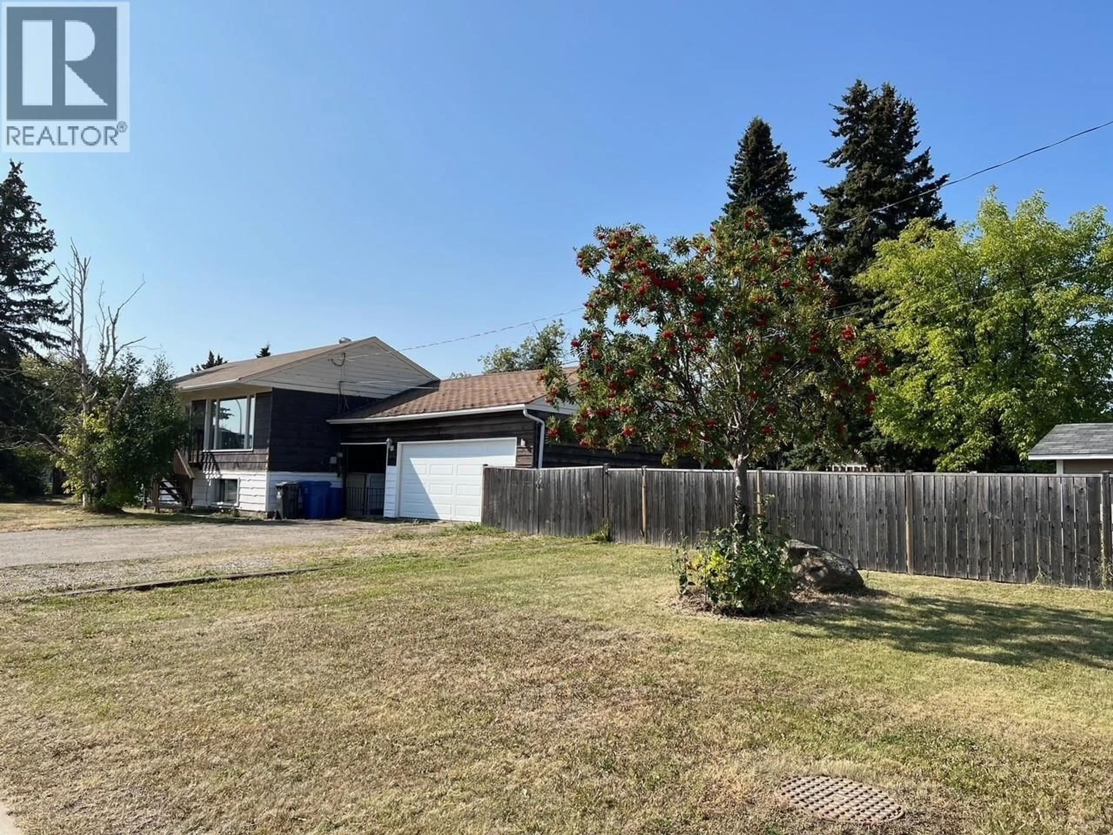 A pic from outside/outdoor area/front of a property/back of a property/a pic from drone, street for 9704 81 STREET, Fort St. John British Columbia V1J3C3