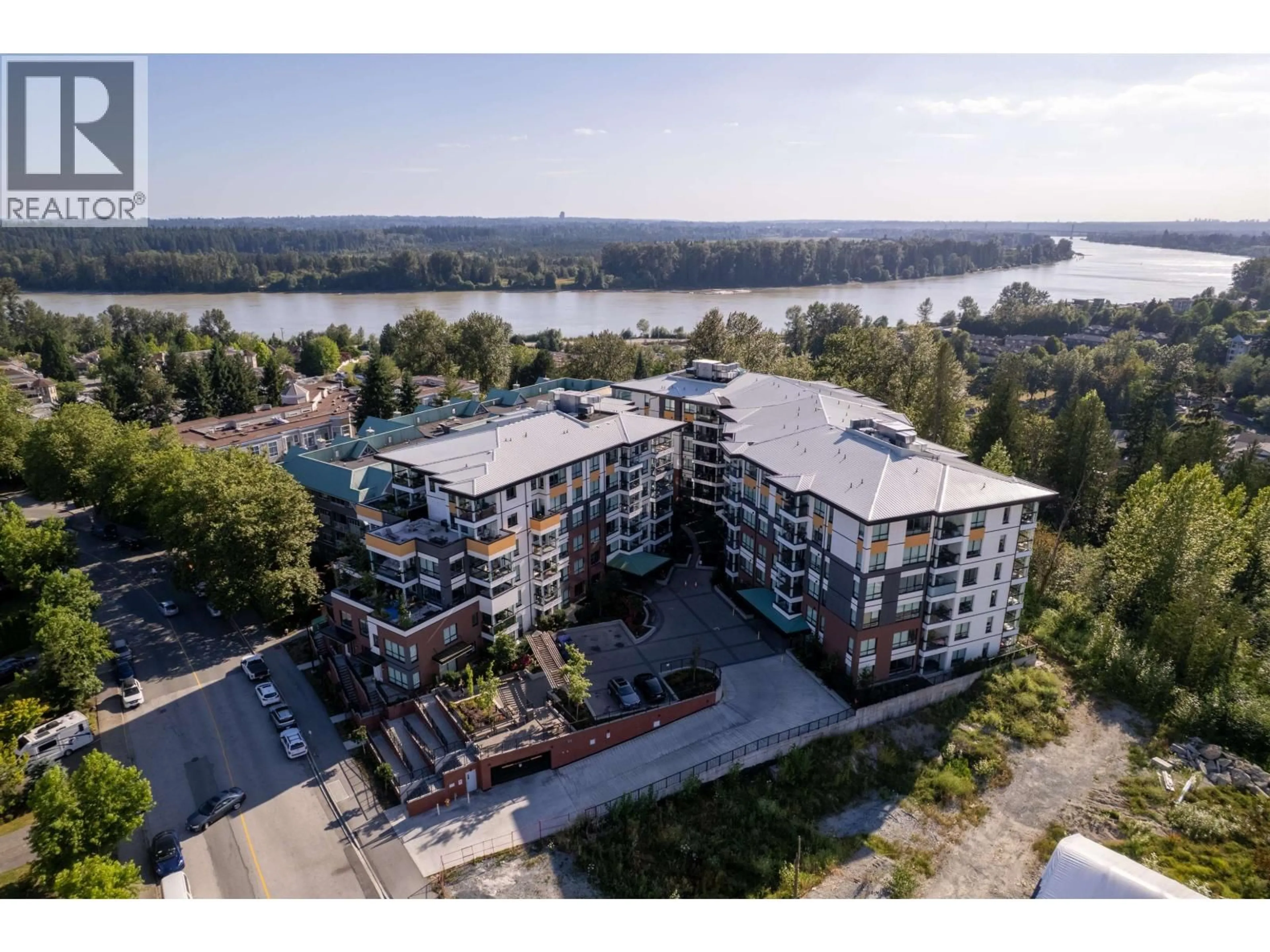 A pic from outside/outdoor area/front of a property/back of a property/a pic from drone, water/lake/river/ocean view for 103 - 11639 227 STREET, Maple Ridge British Columbia V2X9B2