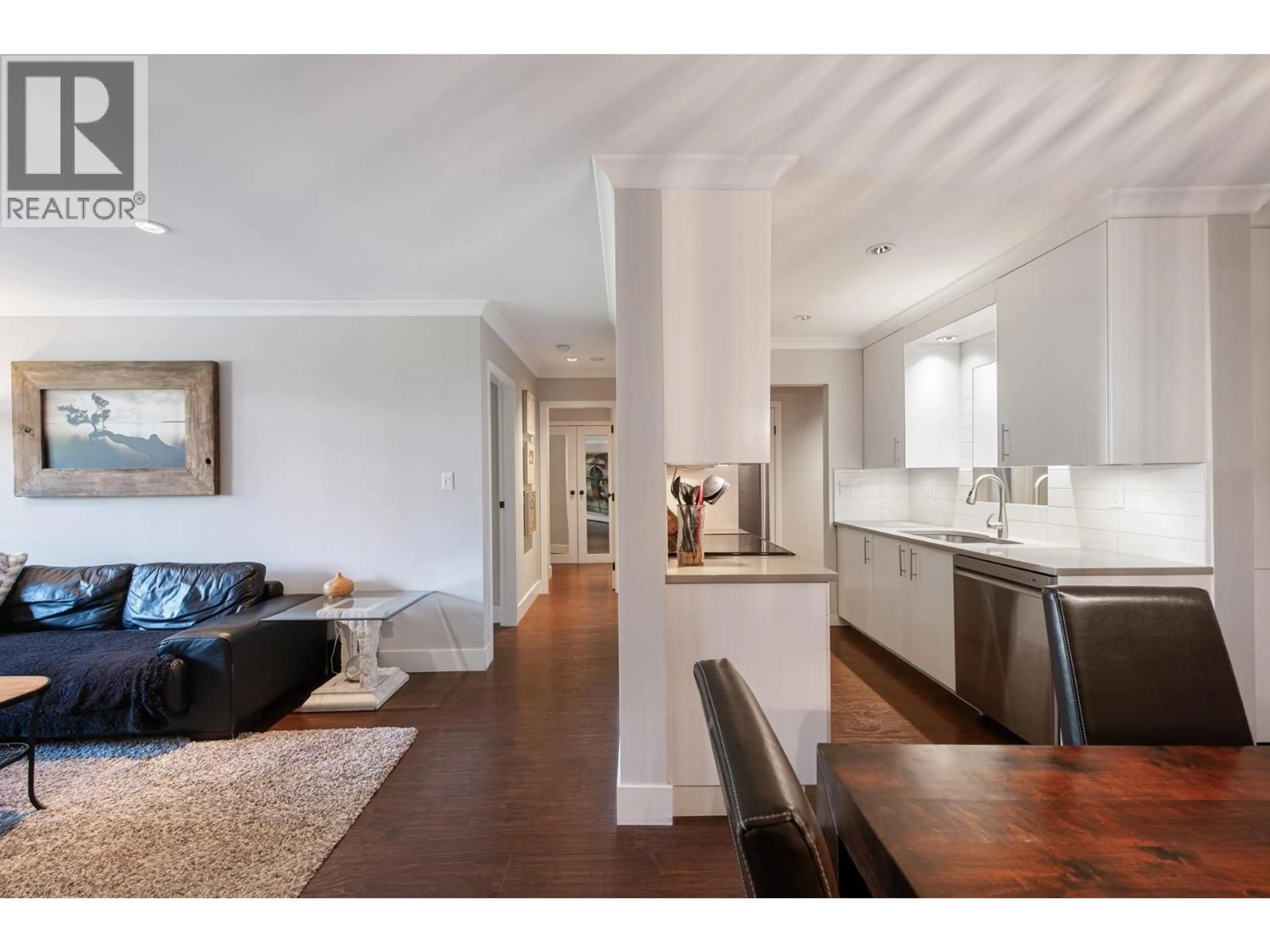 Open concept kitchen, wood/laminate floor for 204 - 341 3RD STREET, North Vancouver British Columbia V7M1G3