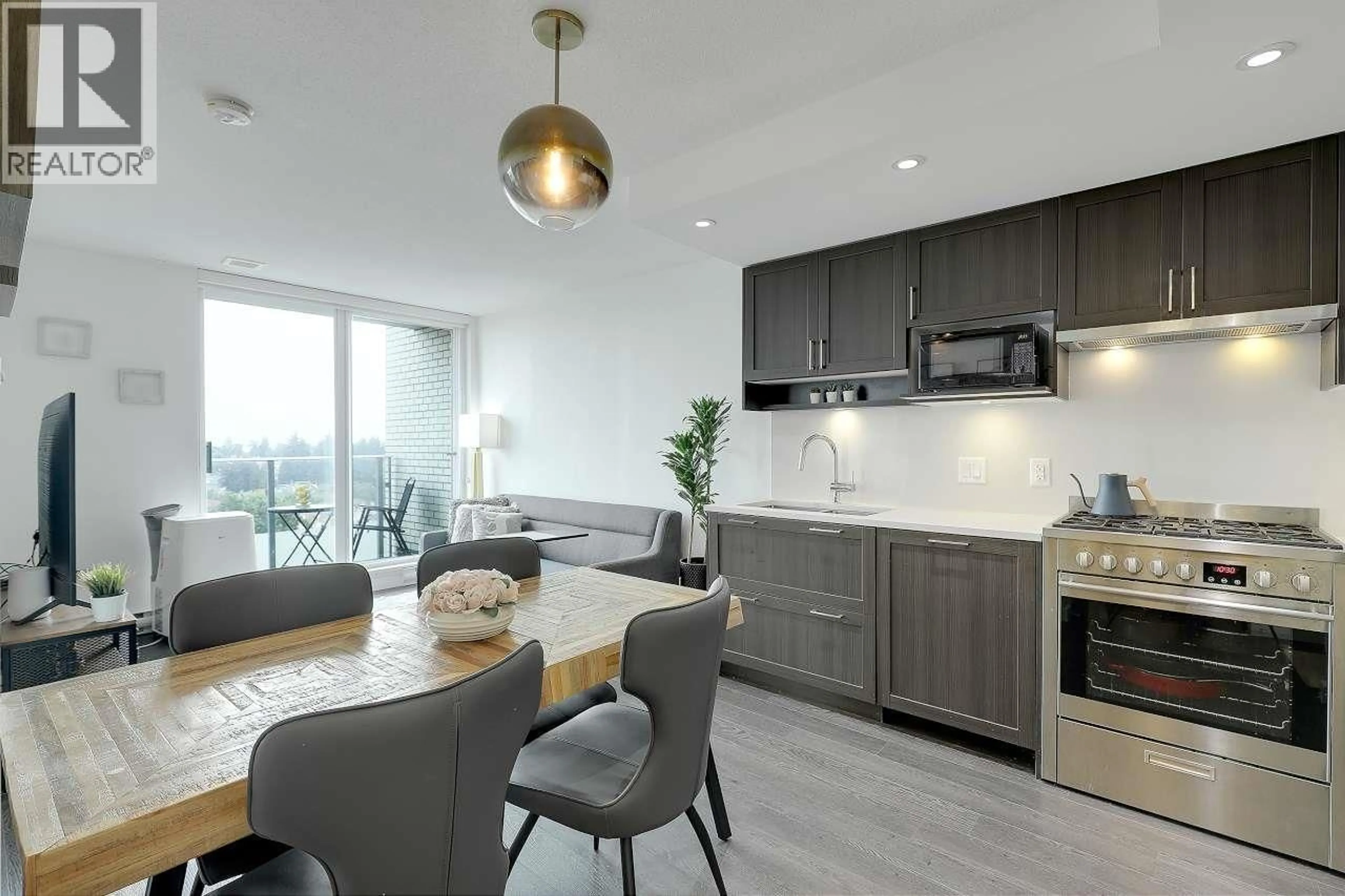 Open concept kitchen, wood/laminate floor for 1206 - 5470 ORMIDALE STREET, Vancouver British Columbia V5R4P9