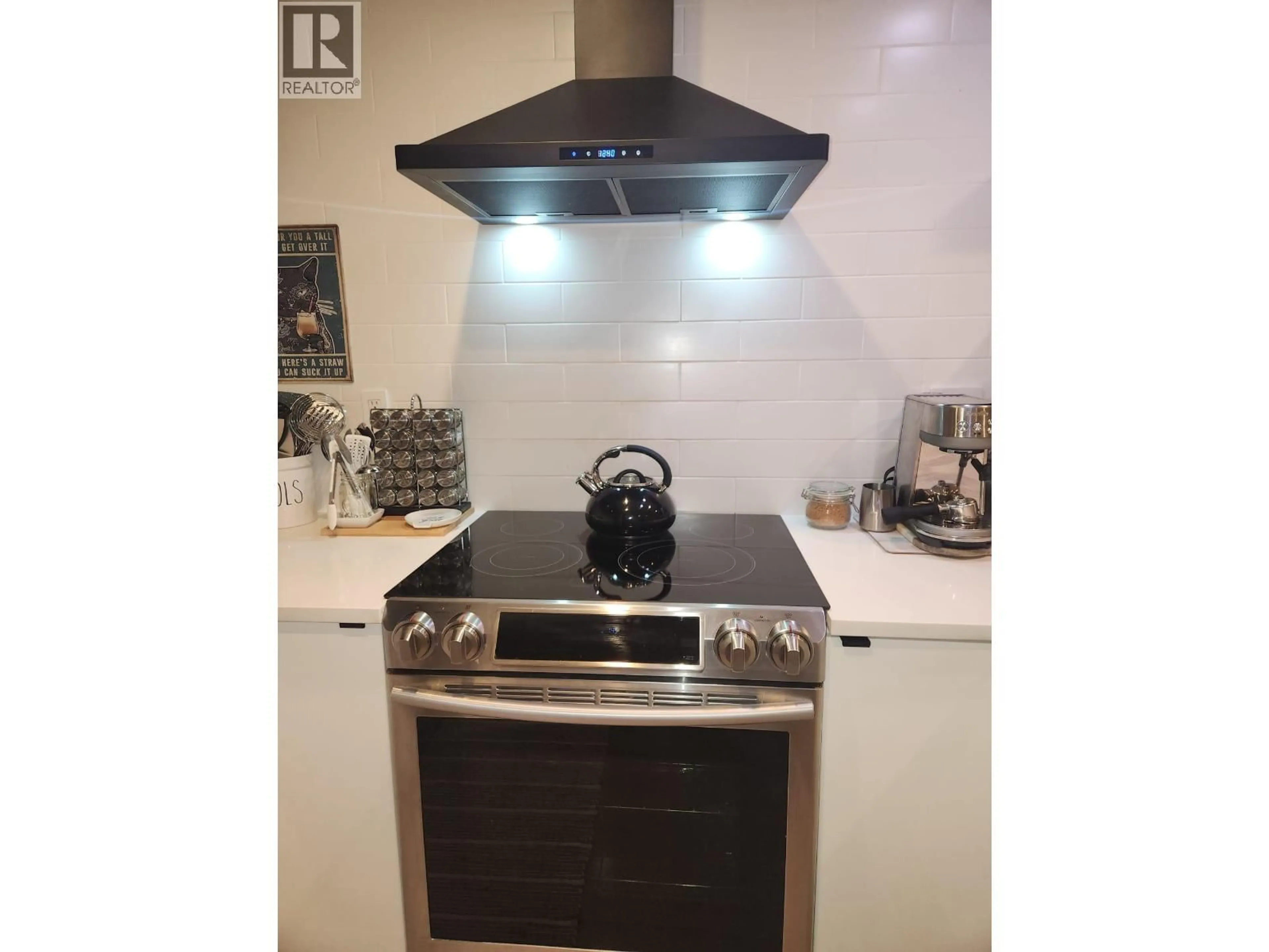 Contemporary kitchen, ceramic/tile floor for 402 - 1718 NELSON STREET, Vancouver British Columbia V6G1M8