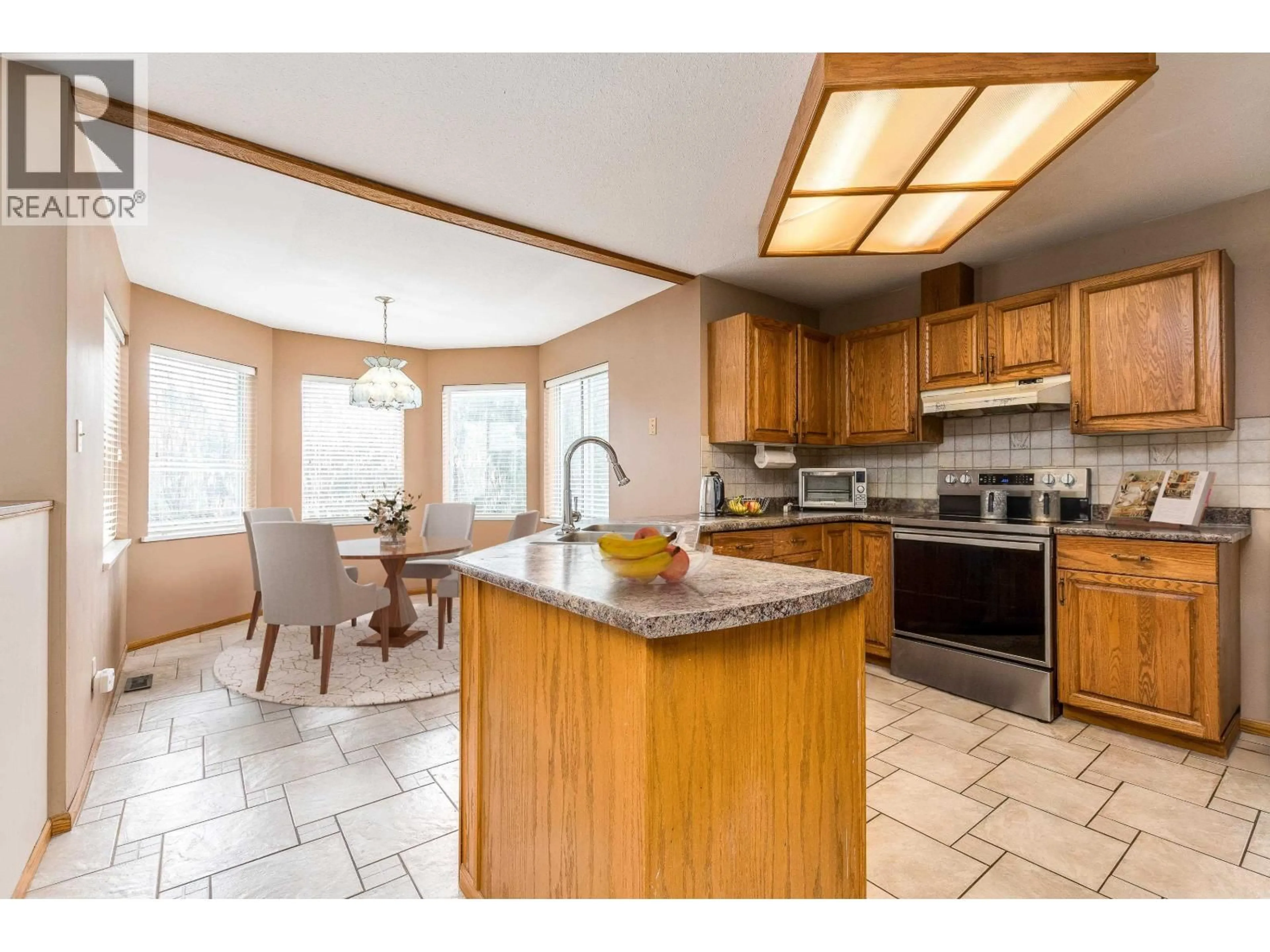 Open concept kitchen, ceramic/tile floor for 133 WARRICK STREET, Coquitlam British Columbia V3K5L3