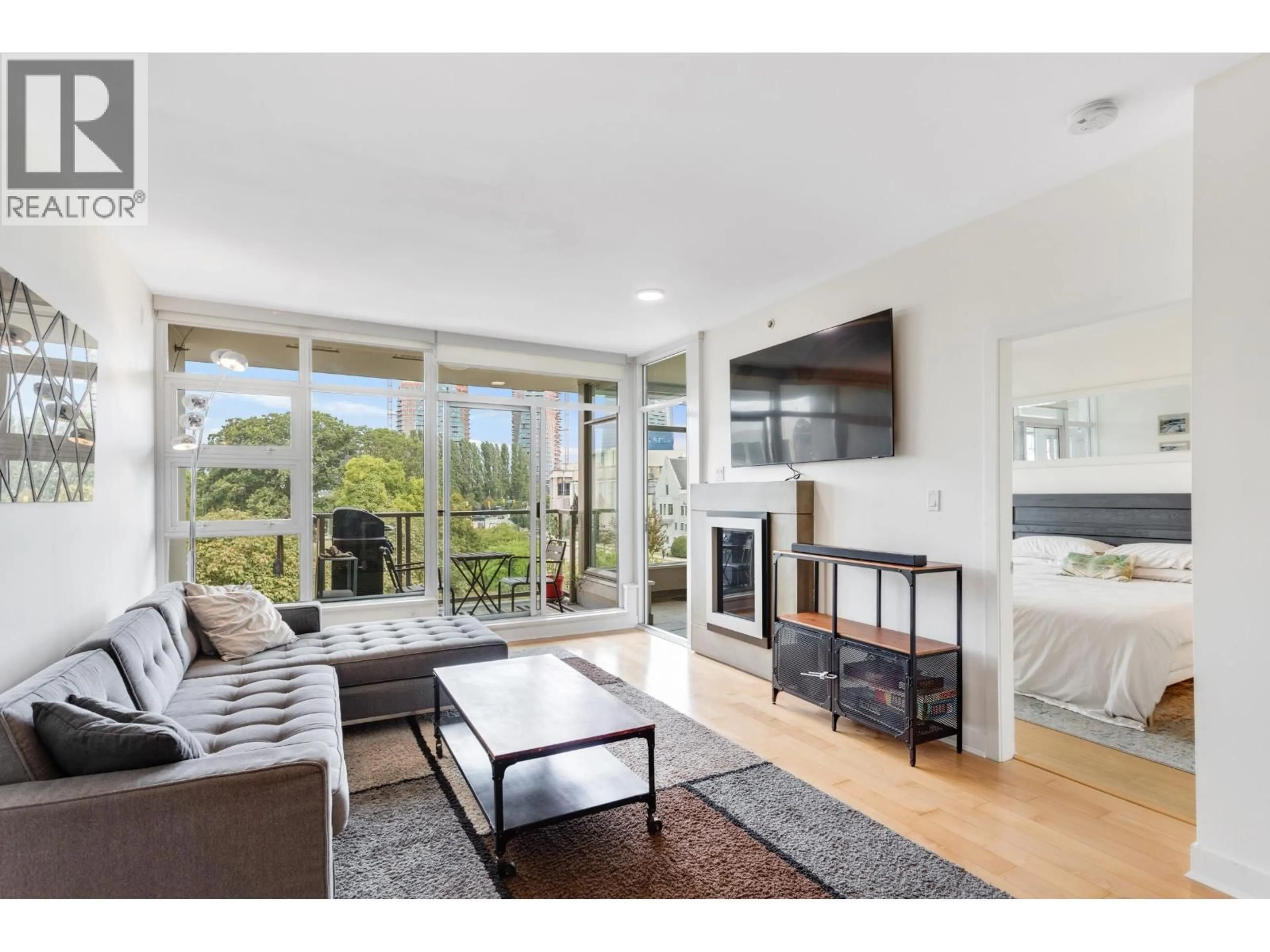 Living room with furniture, wood/laminate floor for 405 - 1808 1ST AVENUE, Vancouver British Columbia V6J0B3