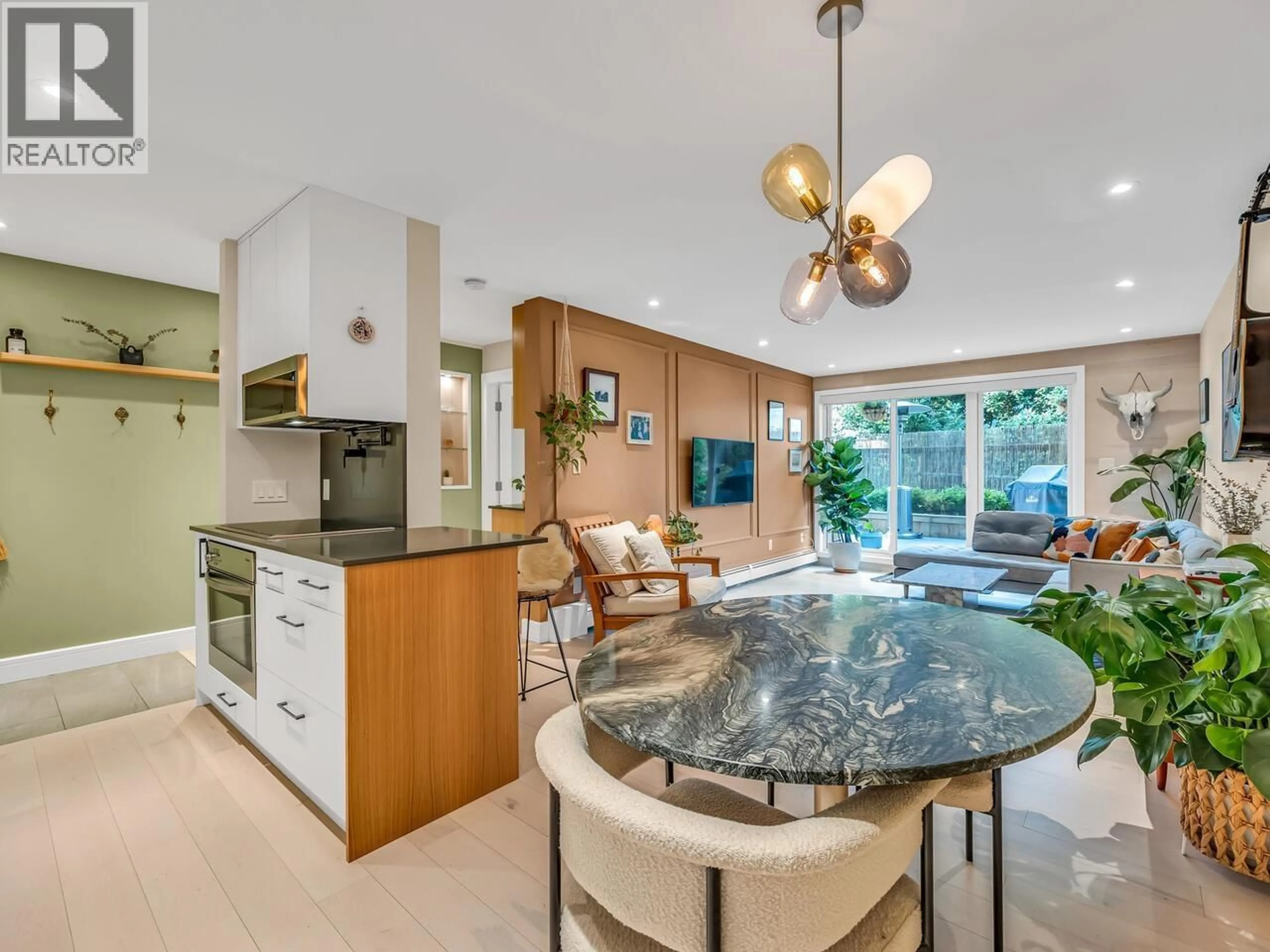 Open concept kitchen, ceramic/tile floor for 102 - 334 5TH AVENUE, Vancouver British Columbia V5T1H4