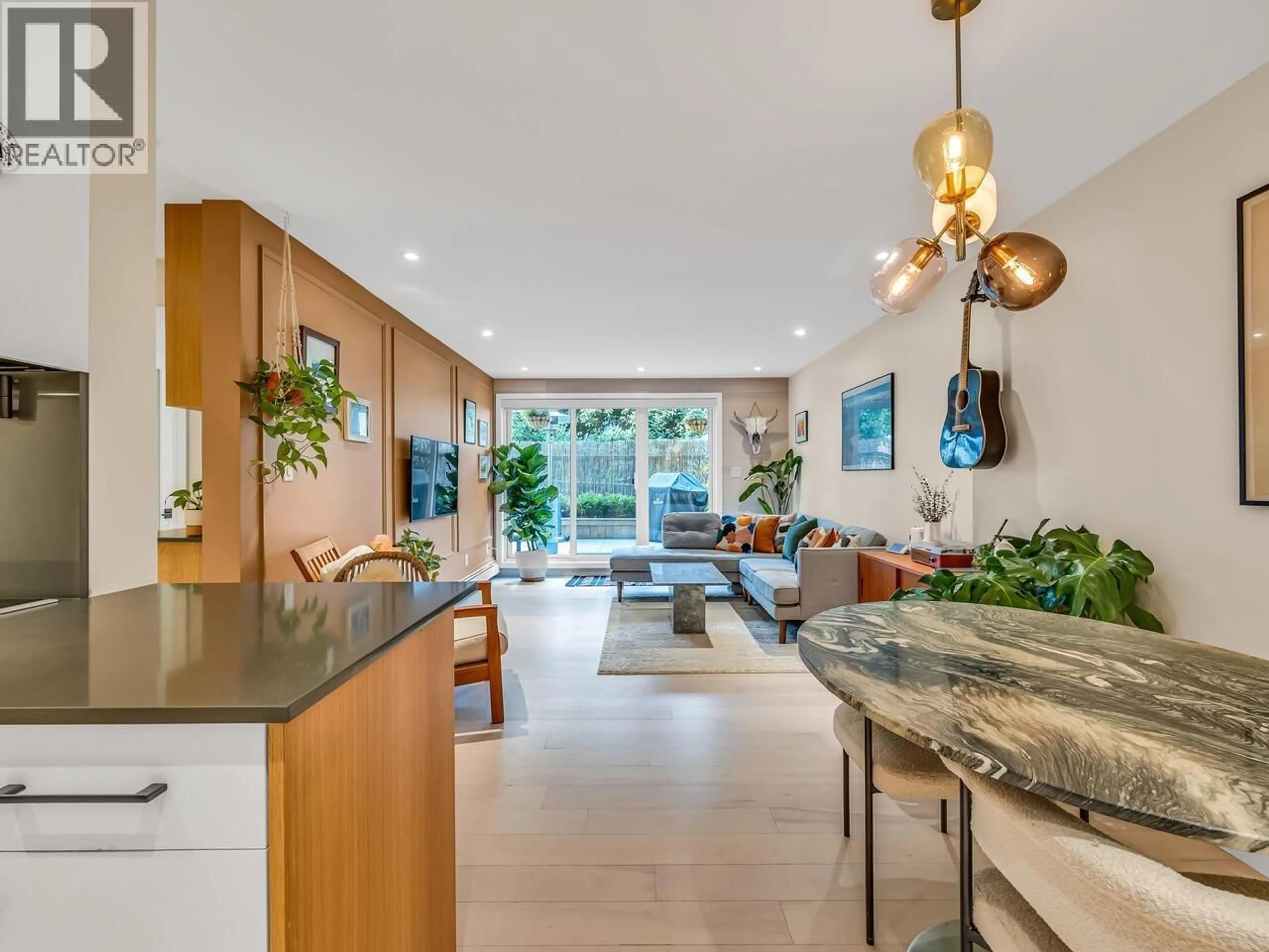 Open concept kitchen, ceramic/tile floor for 102 - 334 5TH AVENUE, Vancouver British Columbia V5T1H4