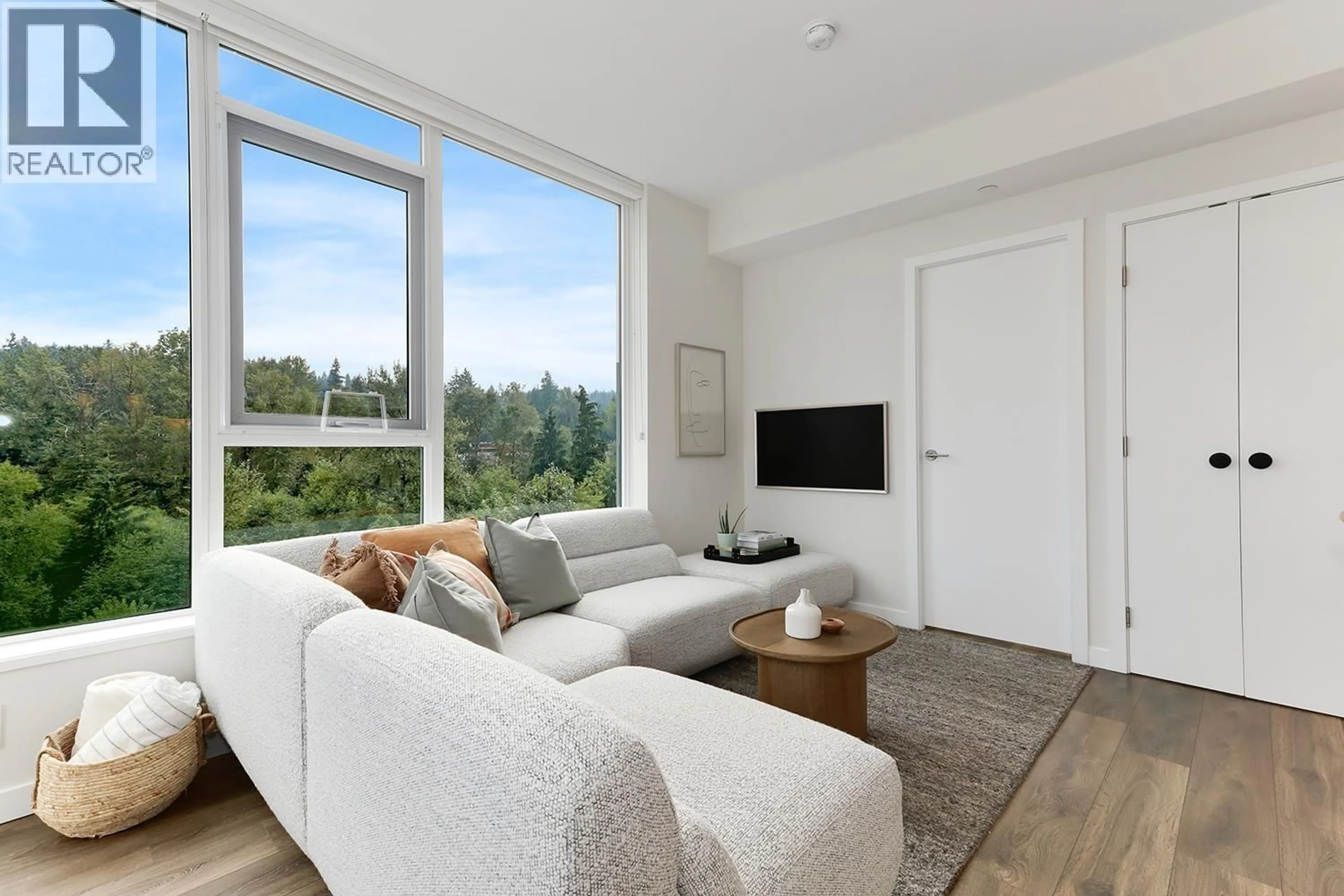 Living room with furniture, unknown for 804 - 305 MORRISSEY ROAD, Port Moody British Columbia V3H0M3