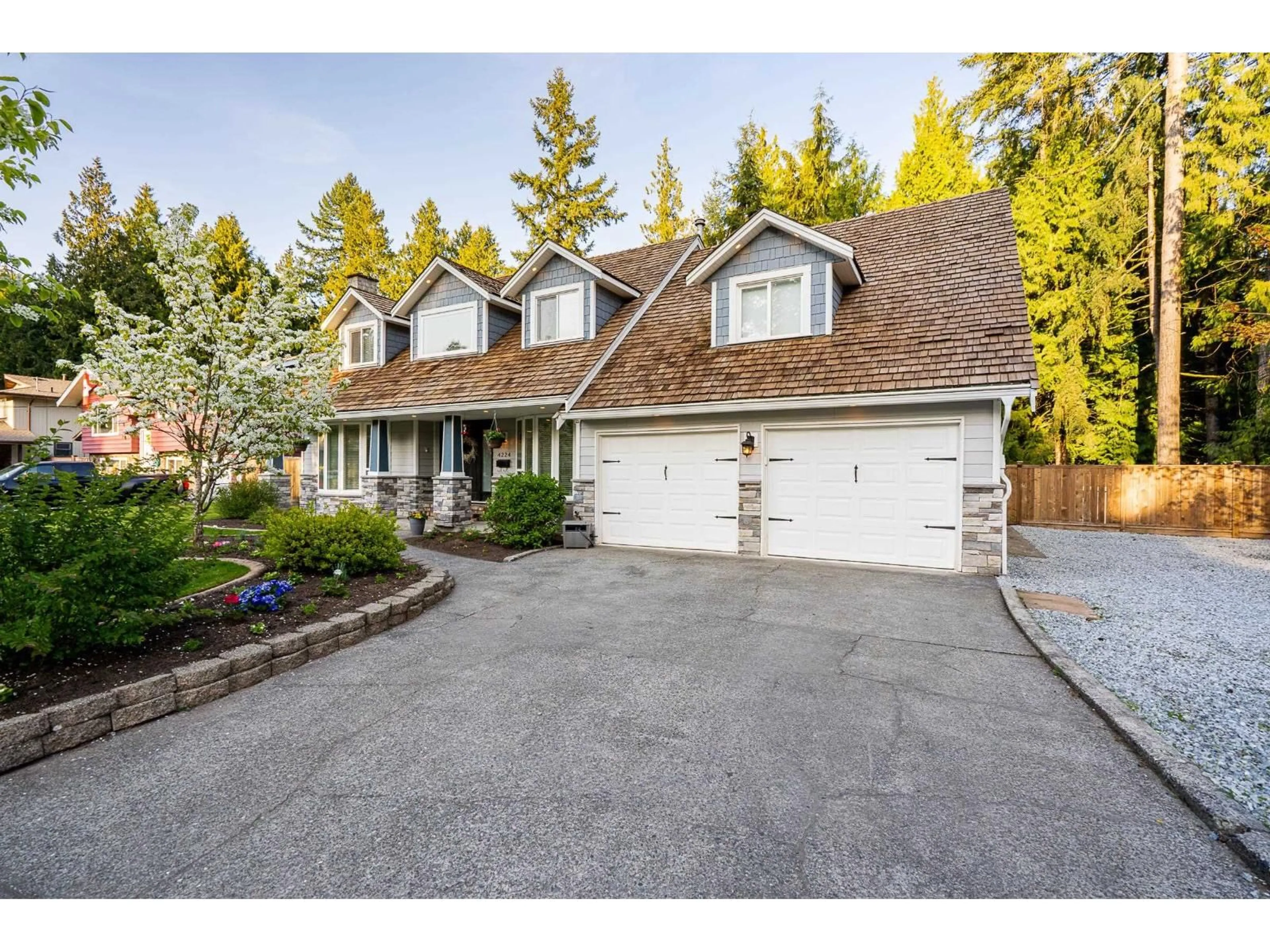 Home with vinyl exterior material, street for 4224 196B, Langley British Columbia V3A1B1