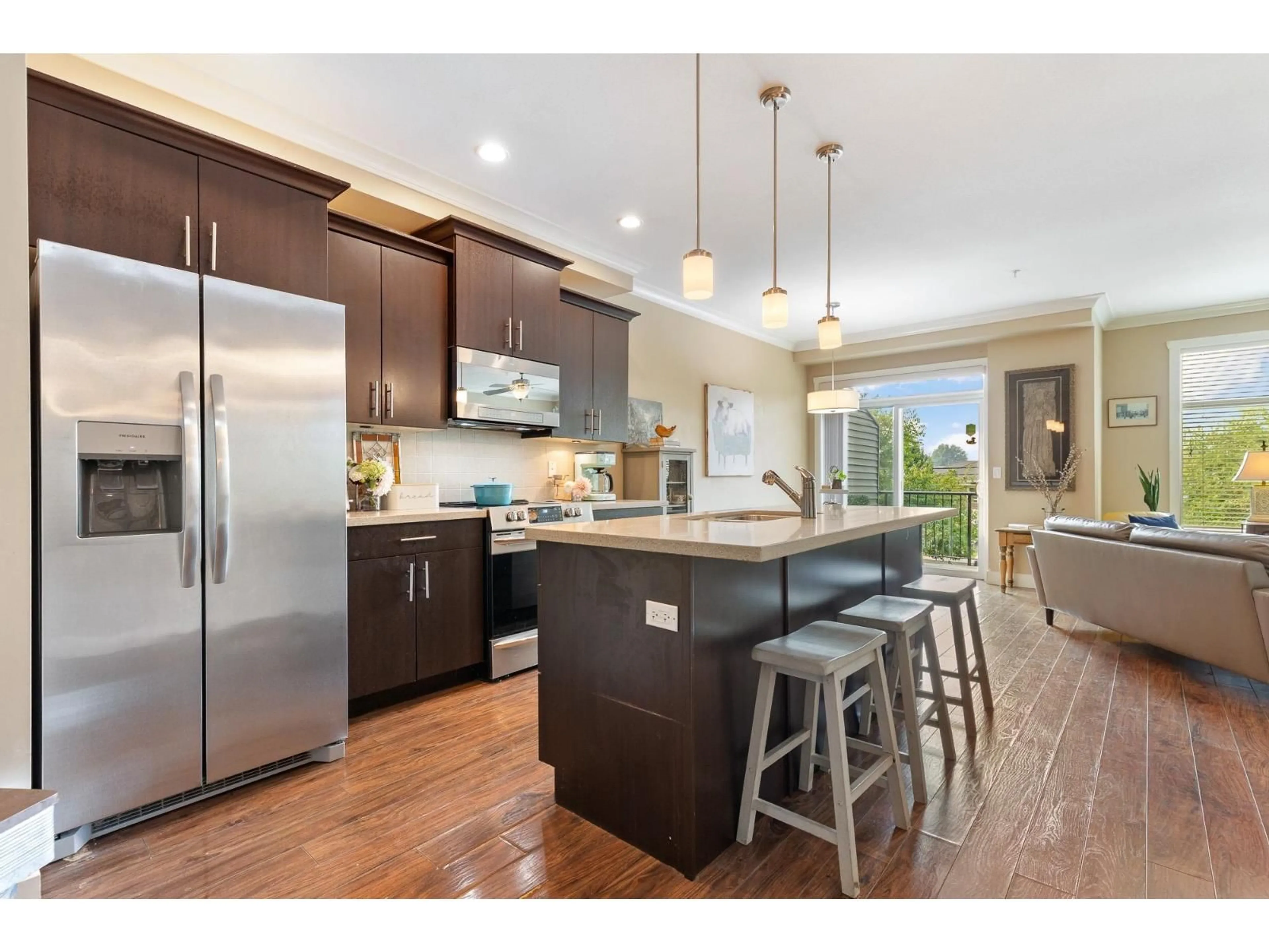 Open concept kitchen, wood/laminate floor for 22 - 45762 SAFFLOWER CRESCENT, Chilliwack British Columbia V2R0S4