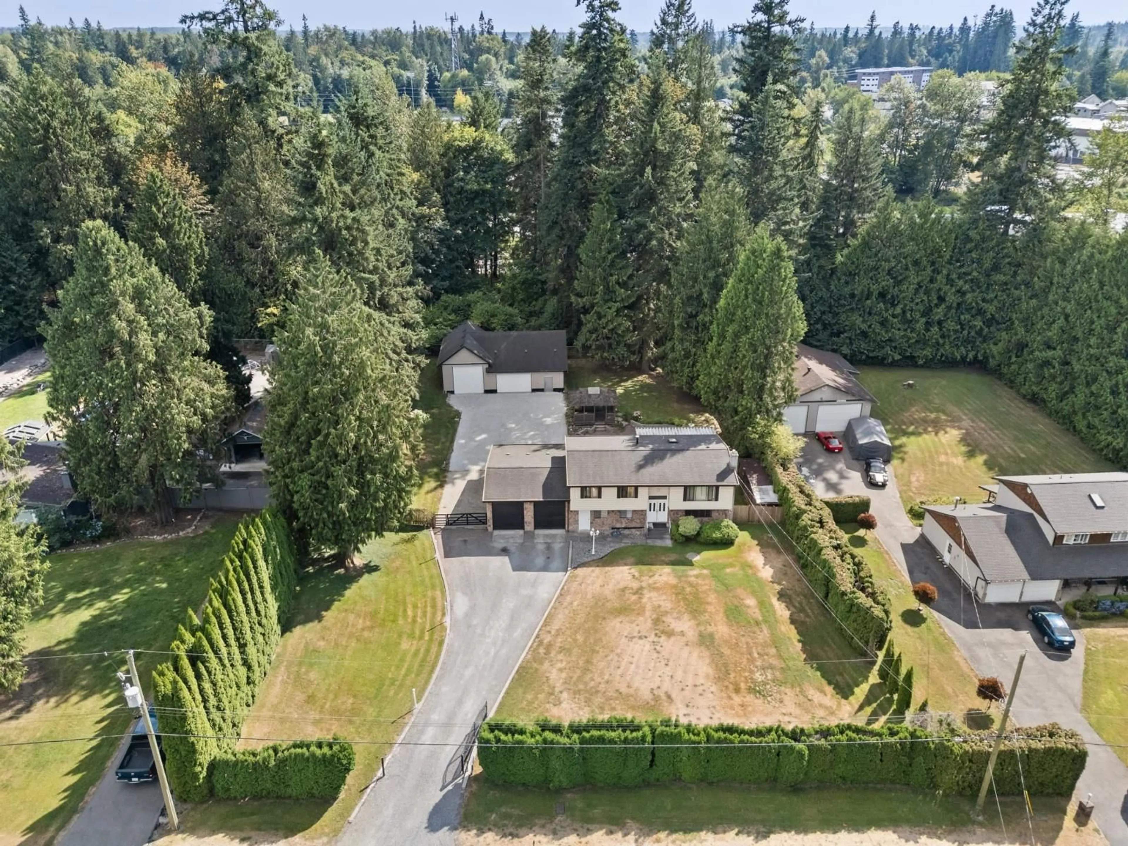 A pic from outside/outdoor area/front of a property/back of a property/a pic from drone, unknown for 22742 76B, Langley British Columbia V1M2J8