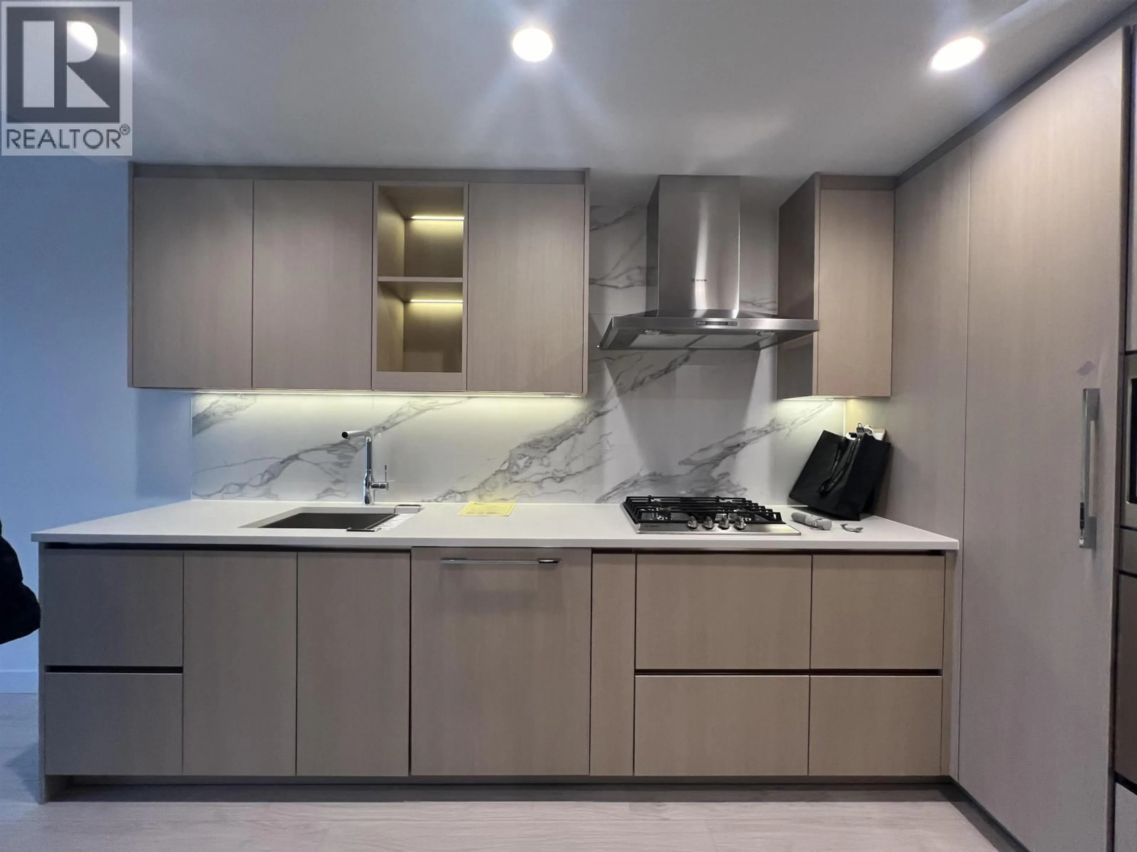 Contemporary kitchen, unknown for 1105 - 4890 LOUGHEED HIGHWAY, Burnaby British Columbia V5C0N2