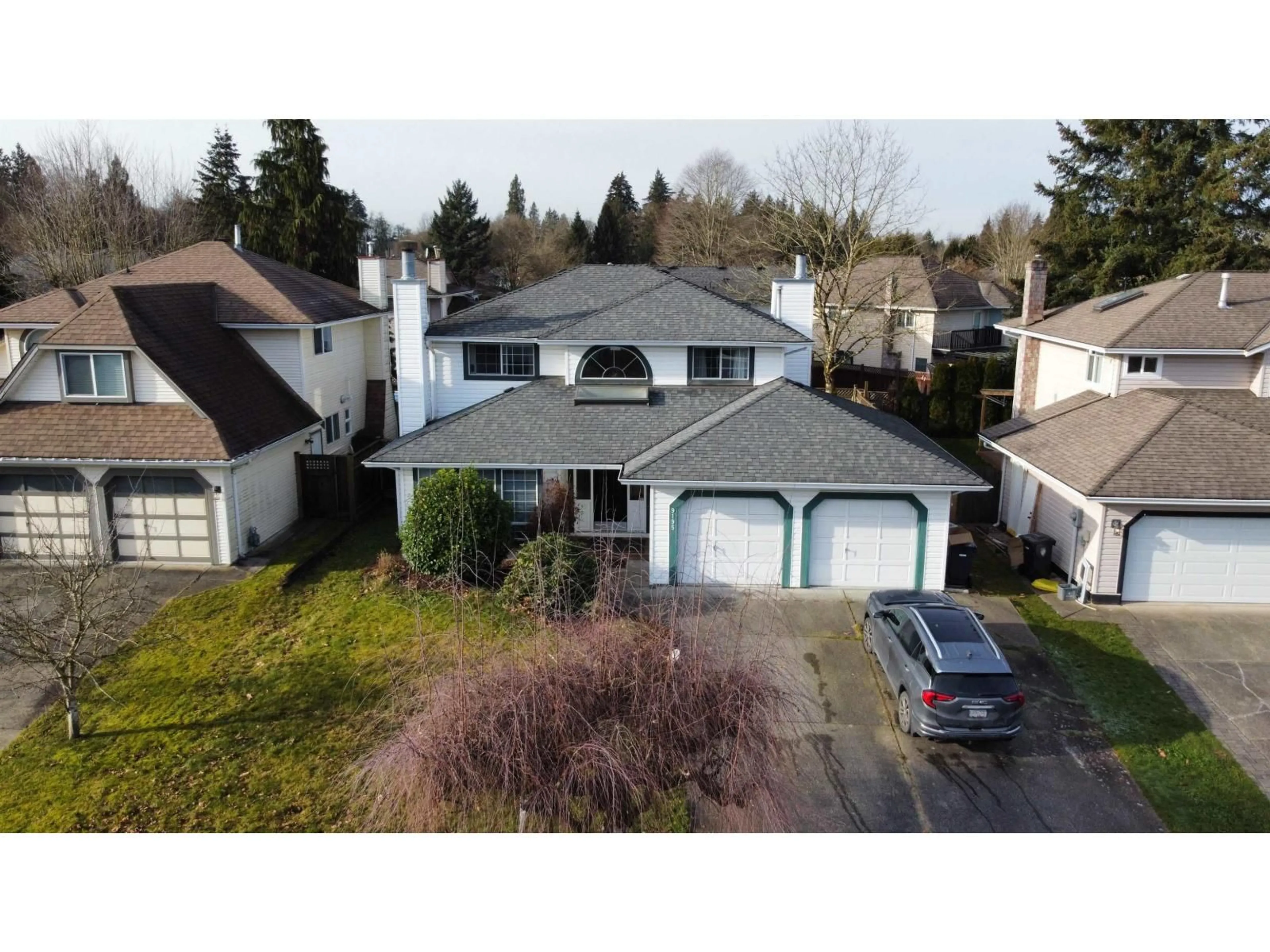 A pic from outside/outdoor area/front of a property/back of a property/a pic from drone, street for 9195 211B, Langley British Columbia V1M2C3