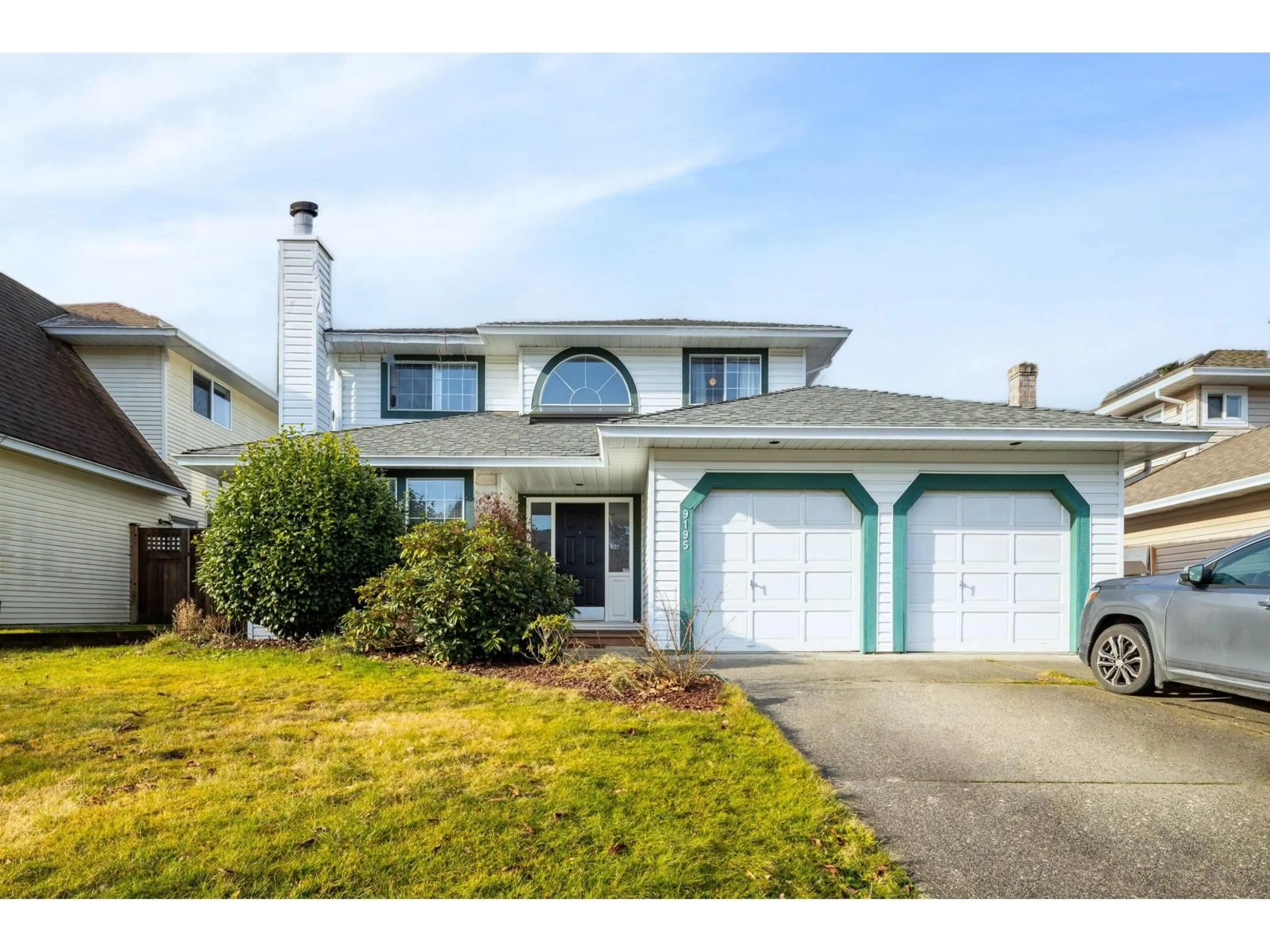 Home with vinyl exterior material, street for 9195 211B, Langley British Columbia V1M2C3