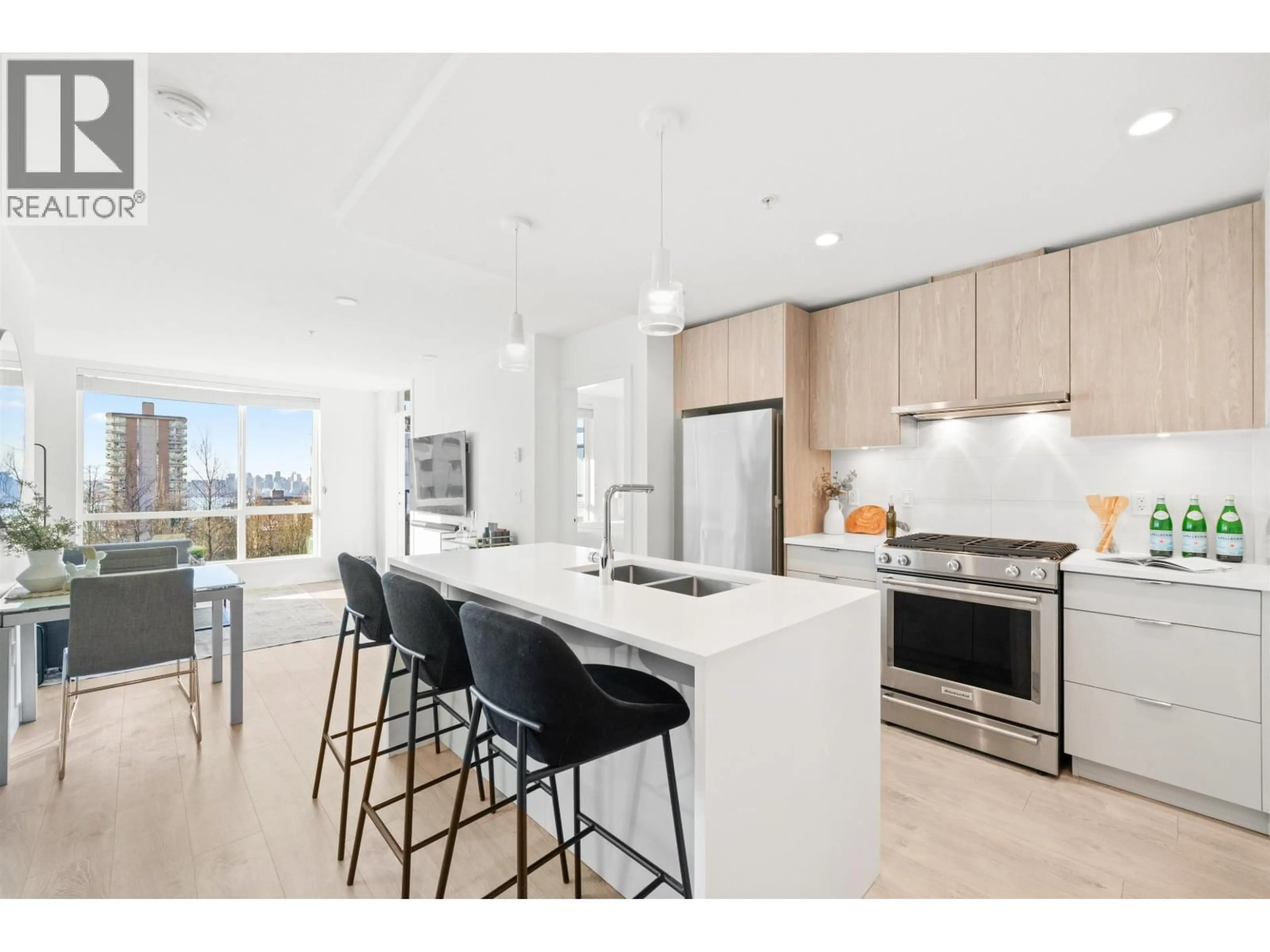 Open concept kitchen, unknown for 304 - 108 8TH STREET, North Vancouver British Columbia V7L0H1
