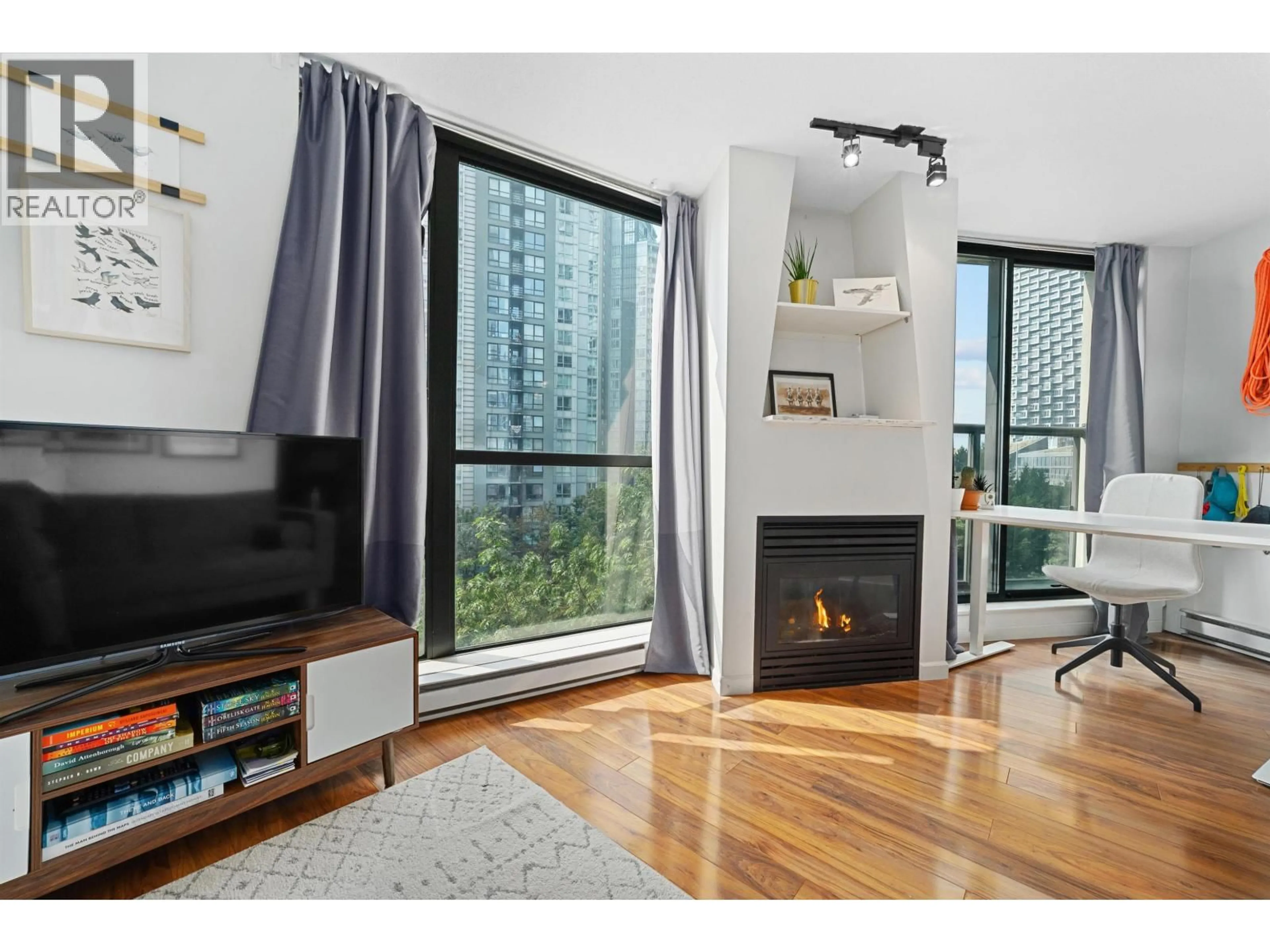 Living room with furniture, wood/laminate floor for 603 - 501 PACIFIC STREET, Vancouver British Columbia V6Z2X6