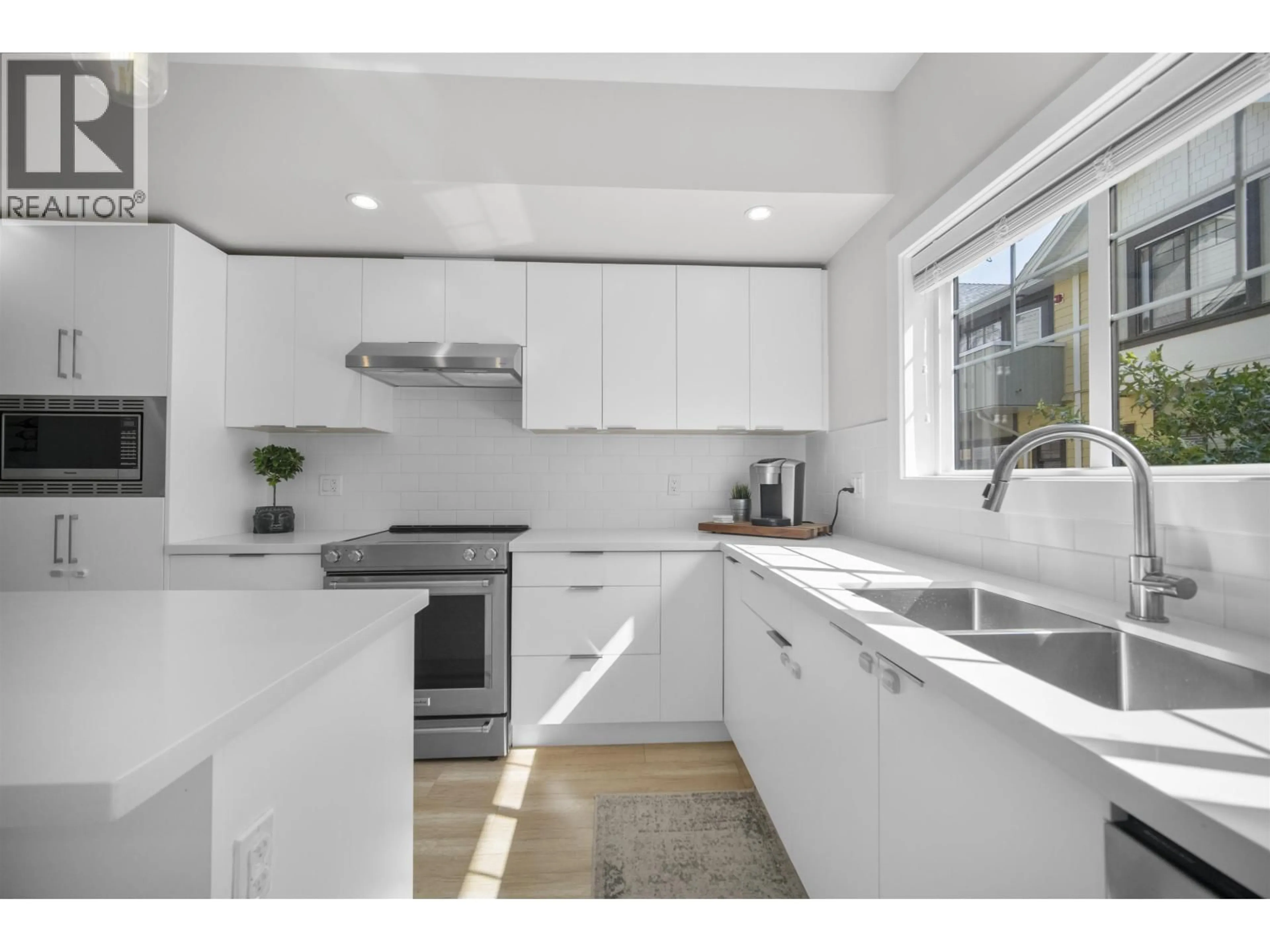 Standard kitchen, ceramic/tile floor for 206 - 80 ELGIN STREET, Port Moody British Columbia V3H0M6