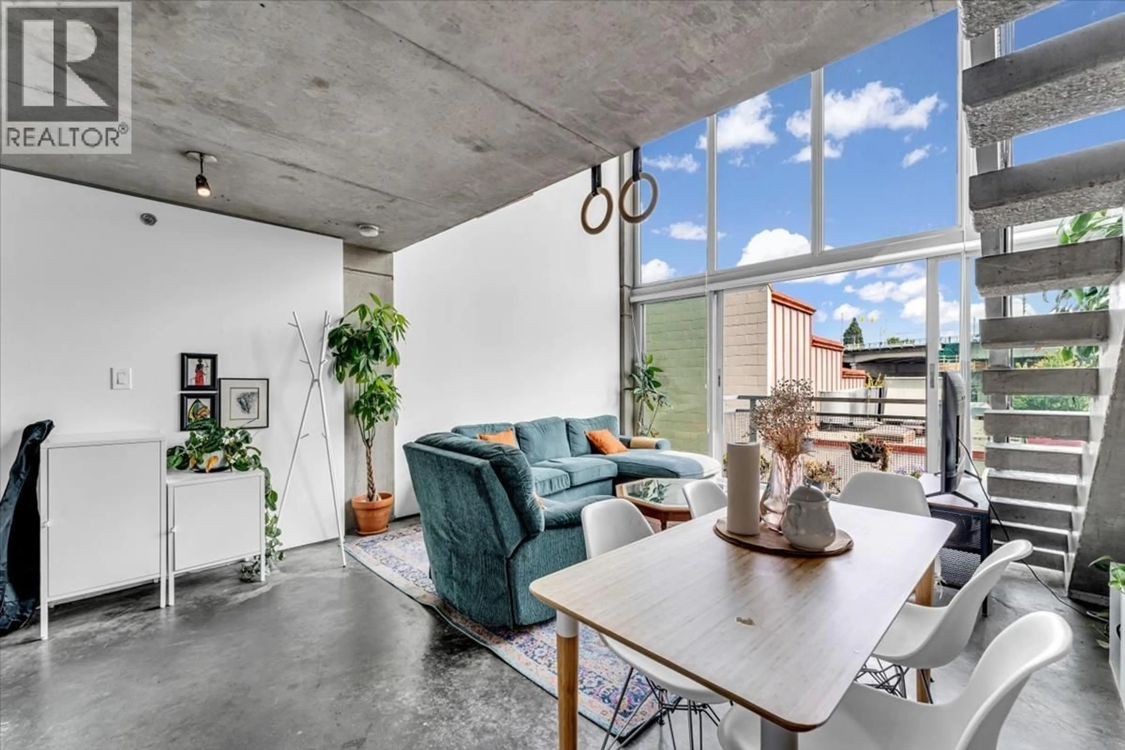 Living room with furniture, cement floor for 516 - 1540 2ND AVENUE, Vancouver British Columbia V6J1H2