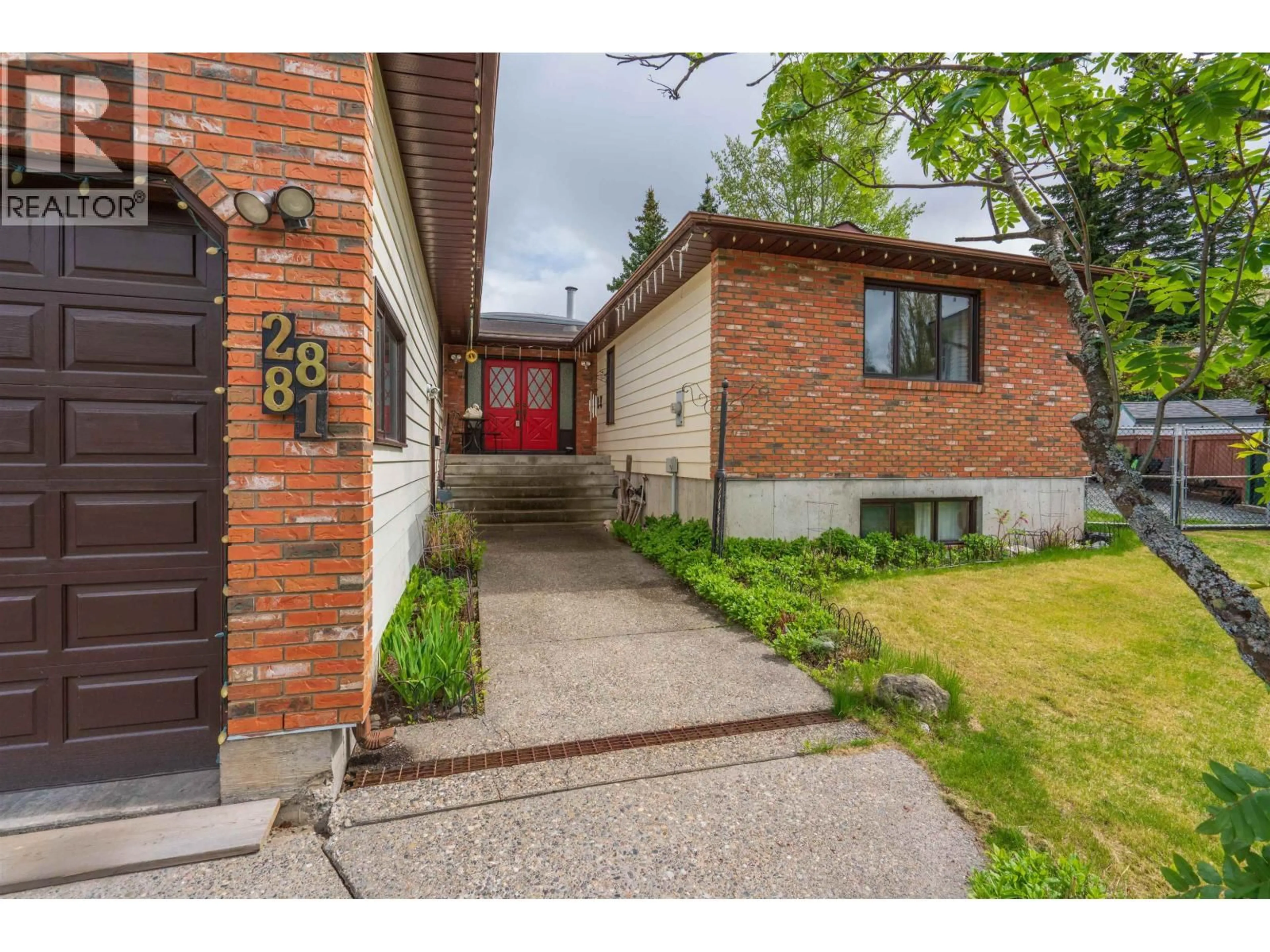 Home with brick exterior material, street for 2881 CALHOUN PLACE, Prince George British Columbia V2N5J5