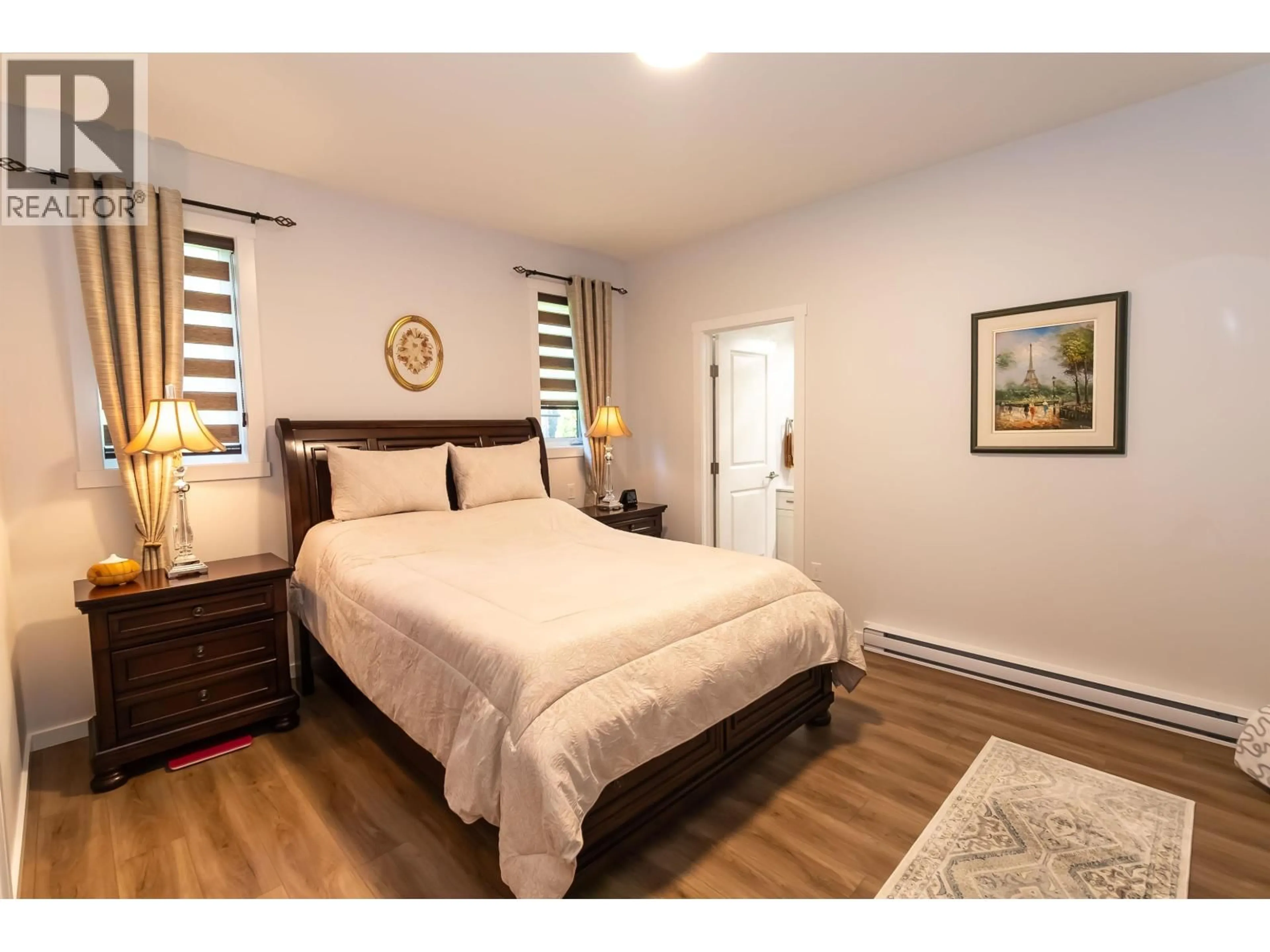 Bedroom with bed, wood/laminate floor for 10 - 4921 HALLIWELL AVENUE, Terrace British Columbia V8G2J7