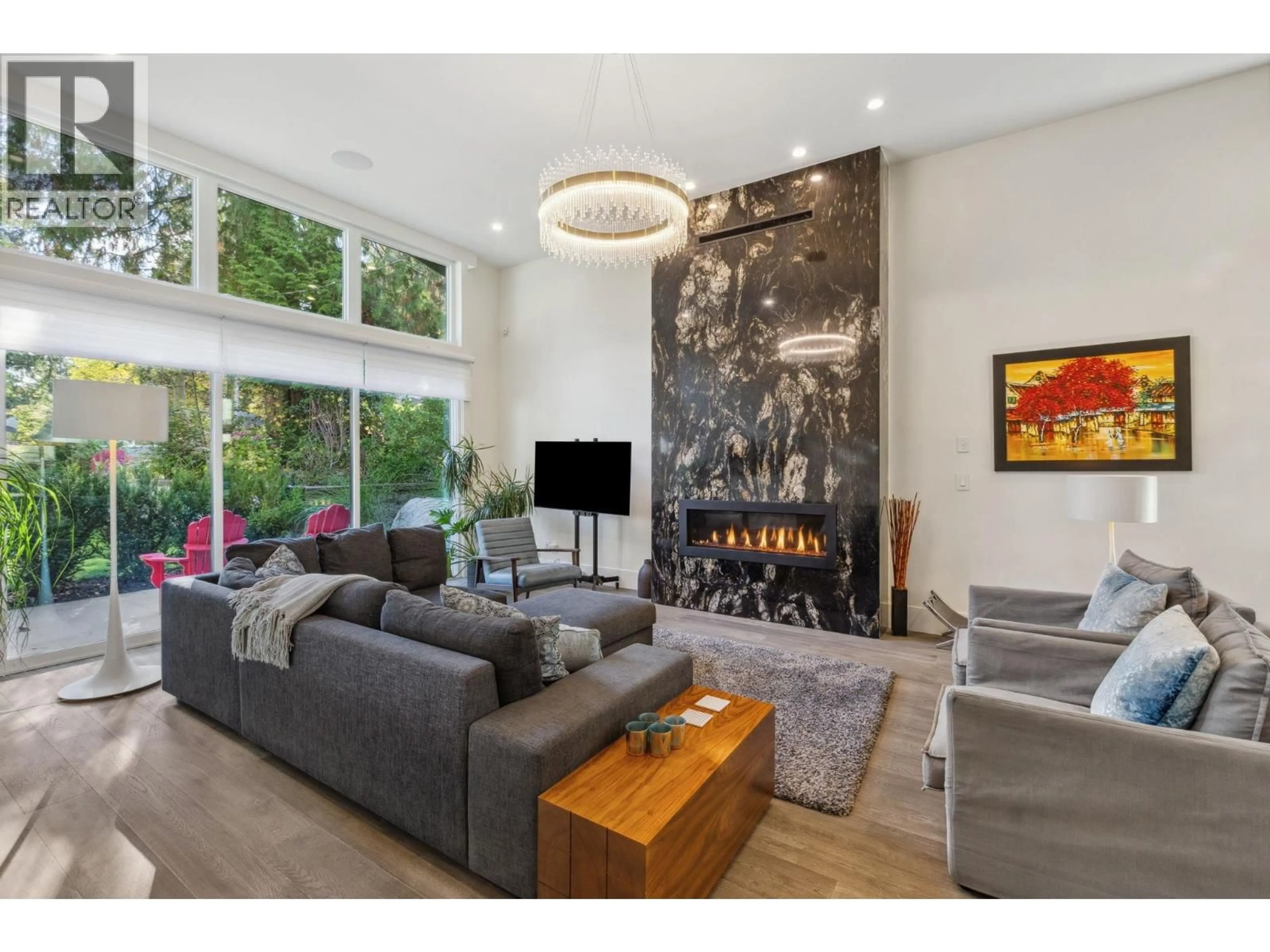 Living room with furniture, wood/laminate floor for 686 OSBORNE ROAD, North Vancouver British Columbia V7N1M7