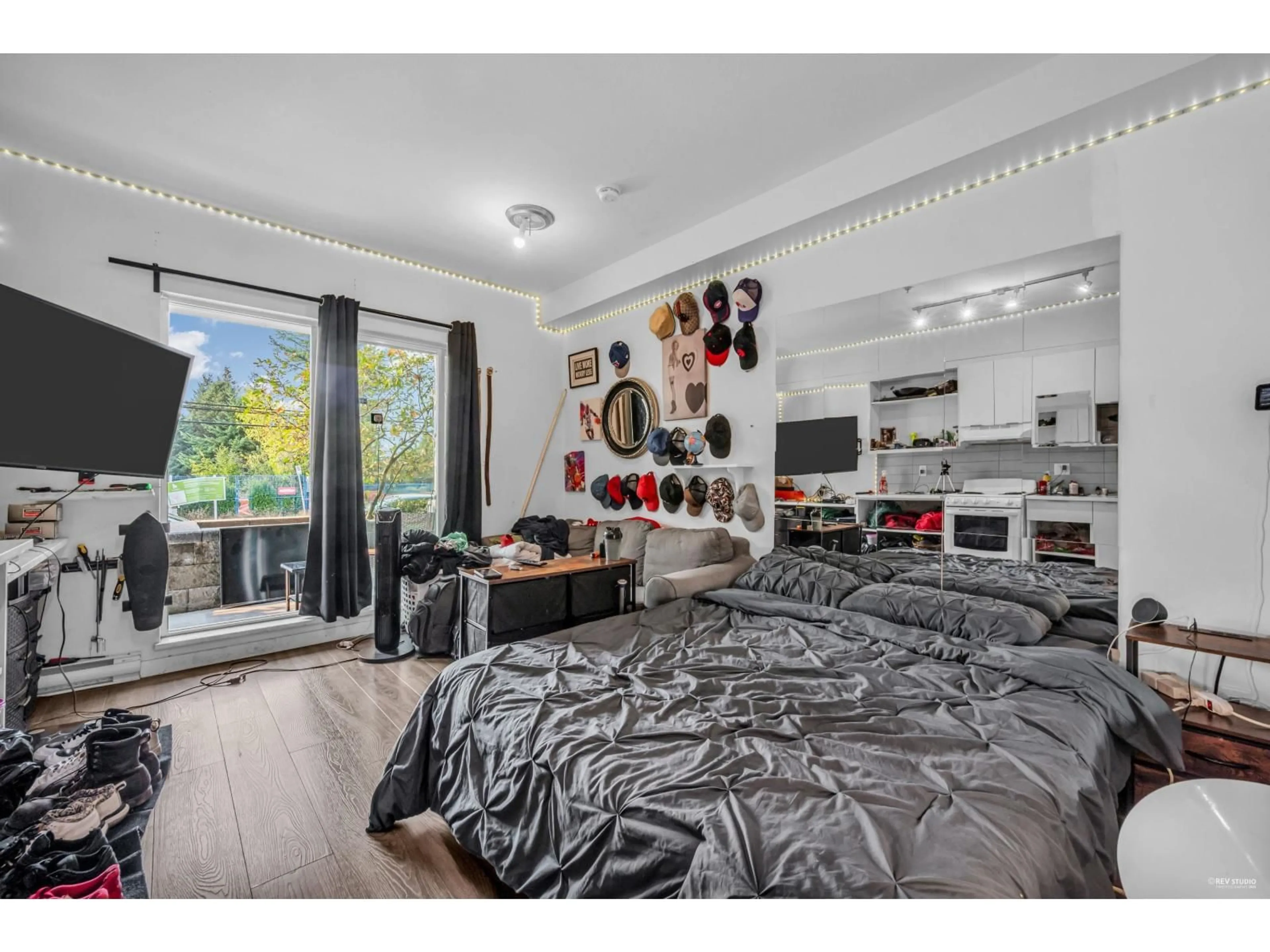Bedroom with bed, wood/laminate floor for 103 - 13678 GROVENSOR, Surrey British Columbia V3R5E2