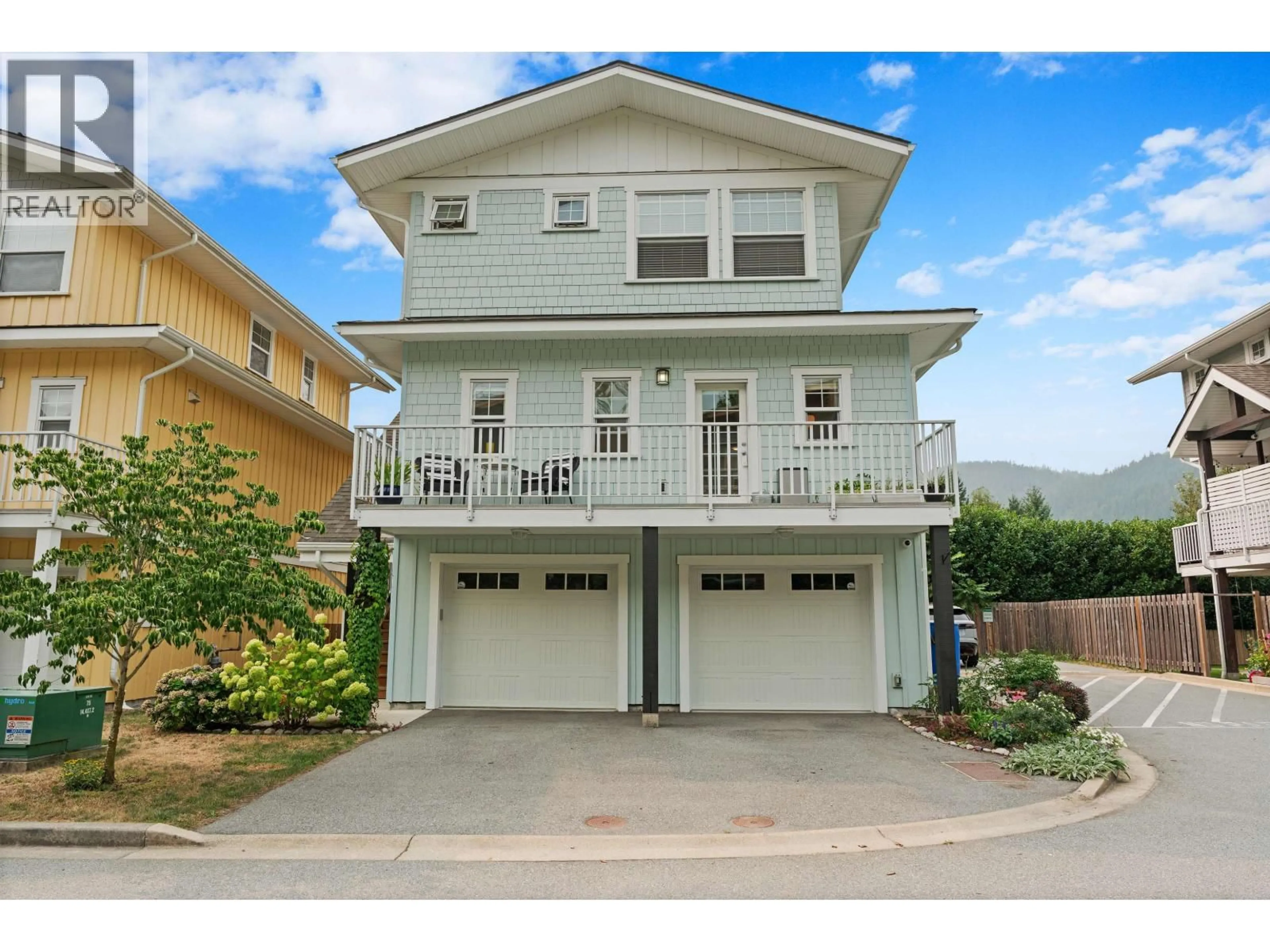 Home with vinyl exterior material, street for 6 - 39885 GOVERNMENT ROAD, Squamish British Columbia V8B0Z2