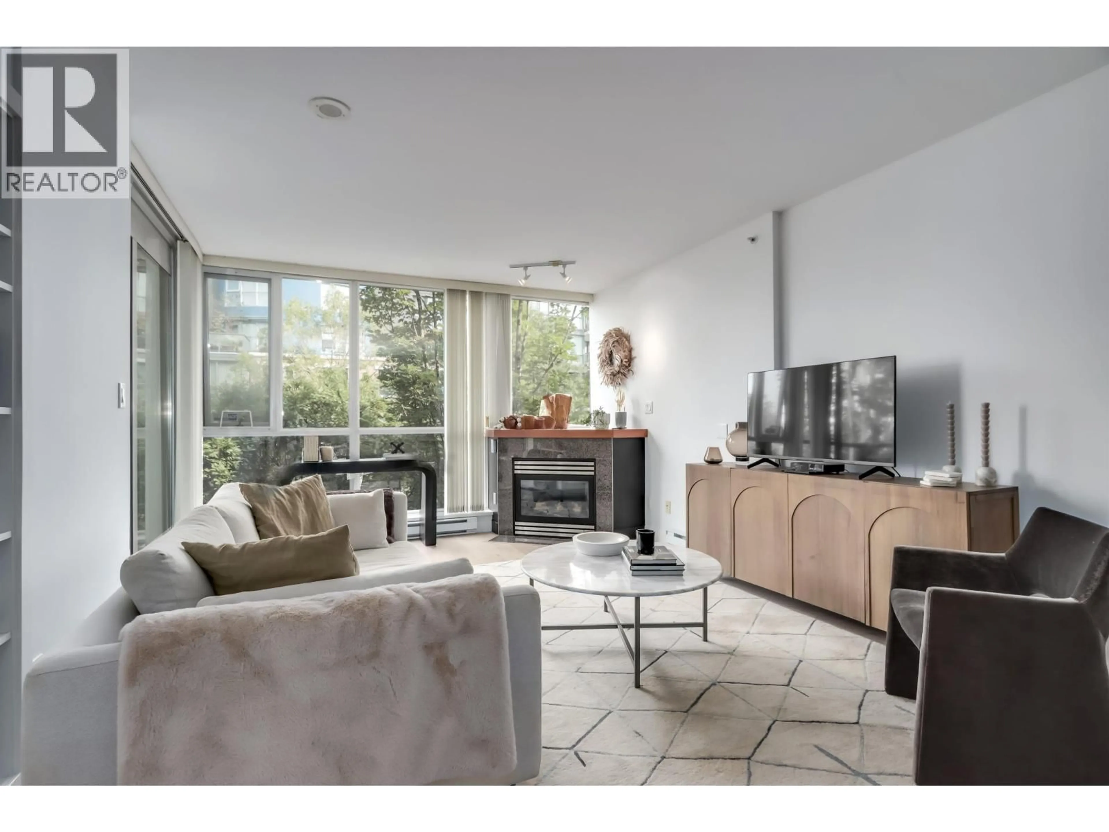 Living room with furniture, unknown for 310 - 1450 6TH AVENUE, Vancouver British Columbia V6H4H9