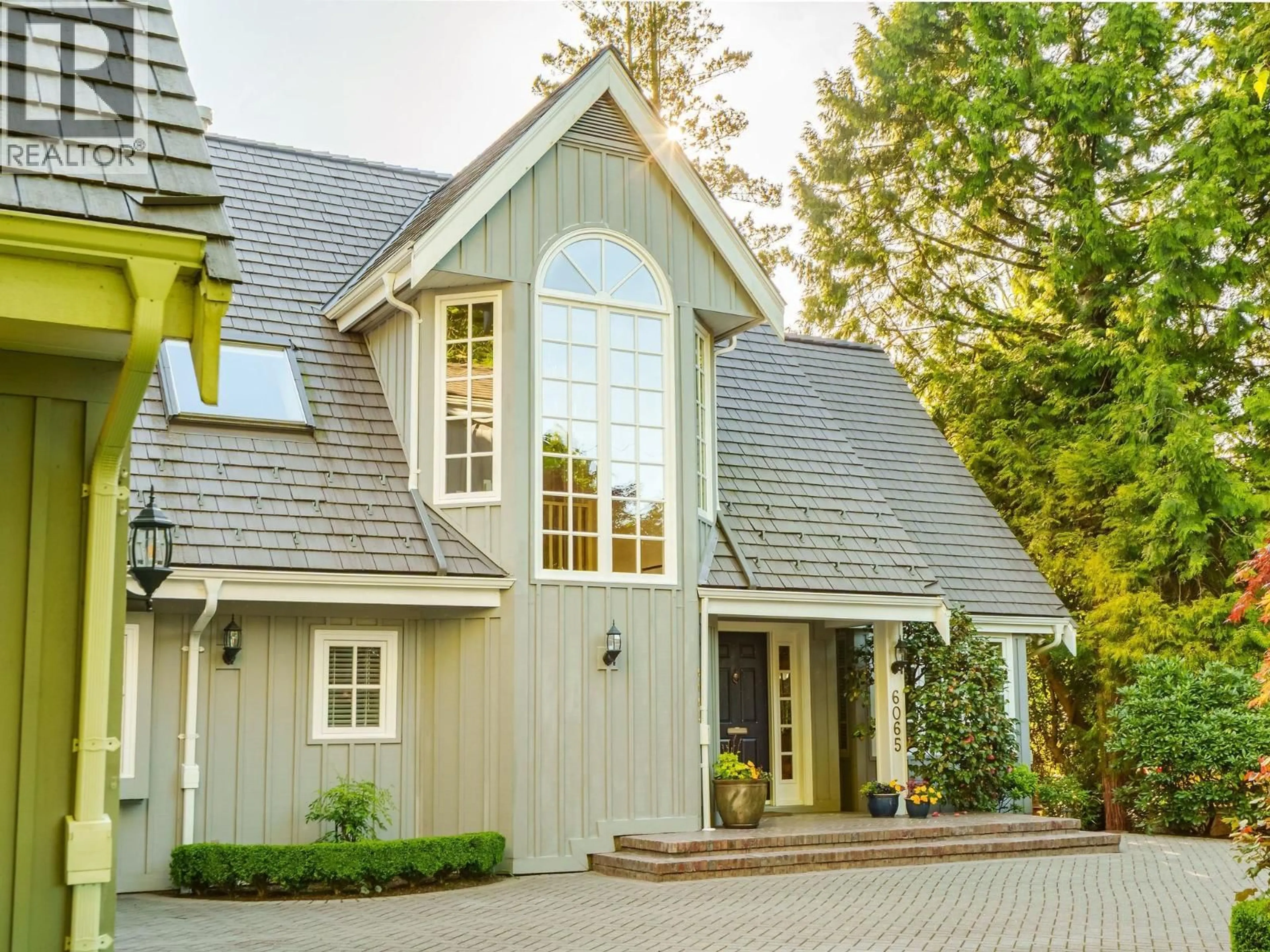Home with vinyl exterior material, street for 6065 BUCKINGHAM AVENUE, Burnaby British Columbia V5E2A5