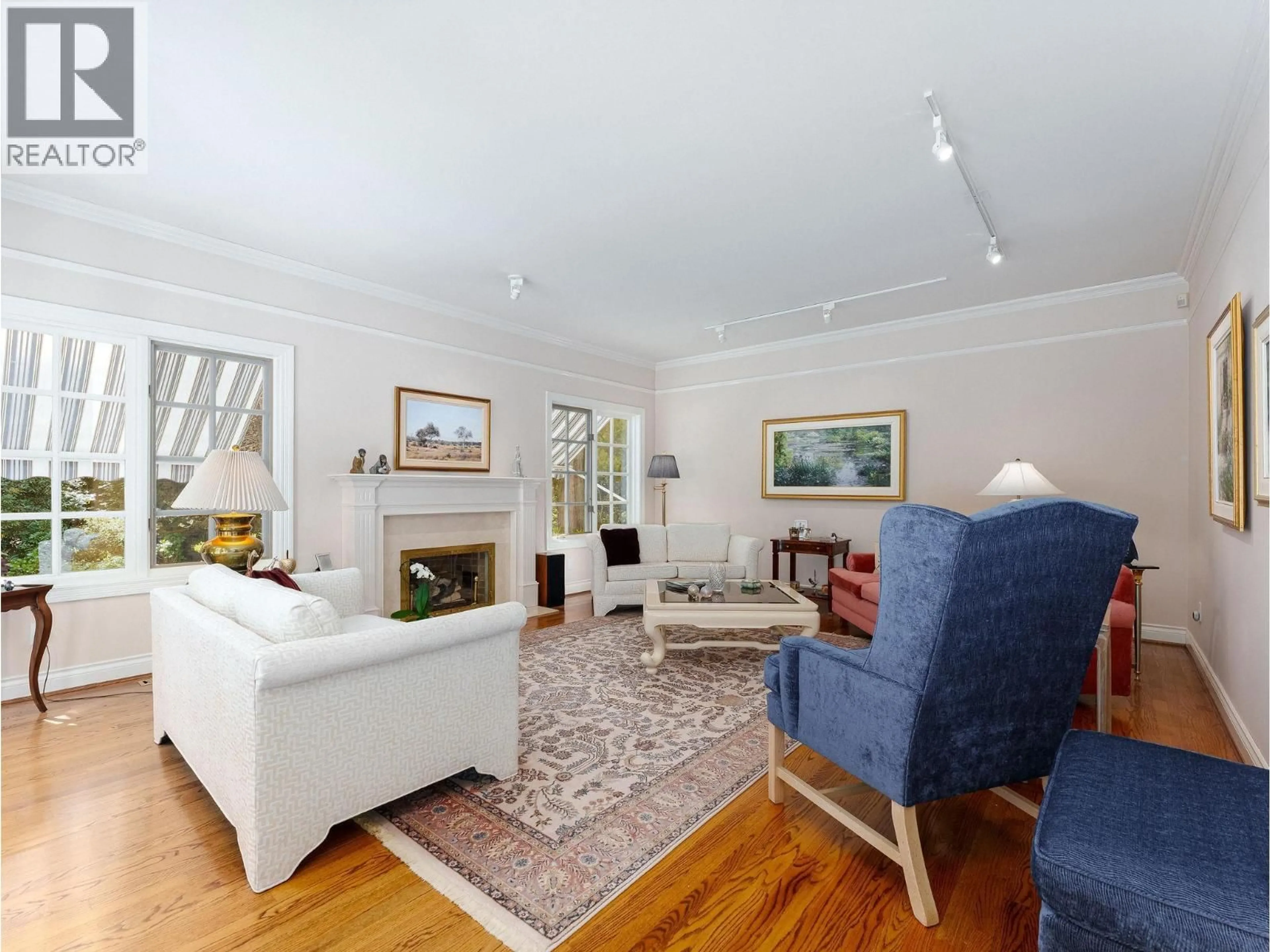 Living room with furniture, unknown for 6065 BUCKINGHAM AVENUE, Burnaby British Columbia V5E2A5