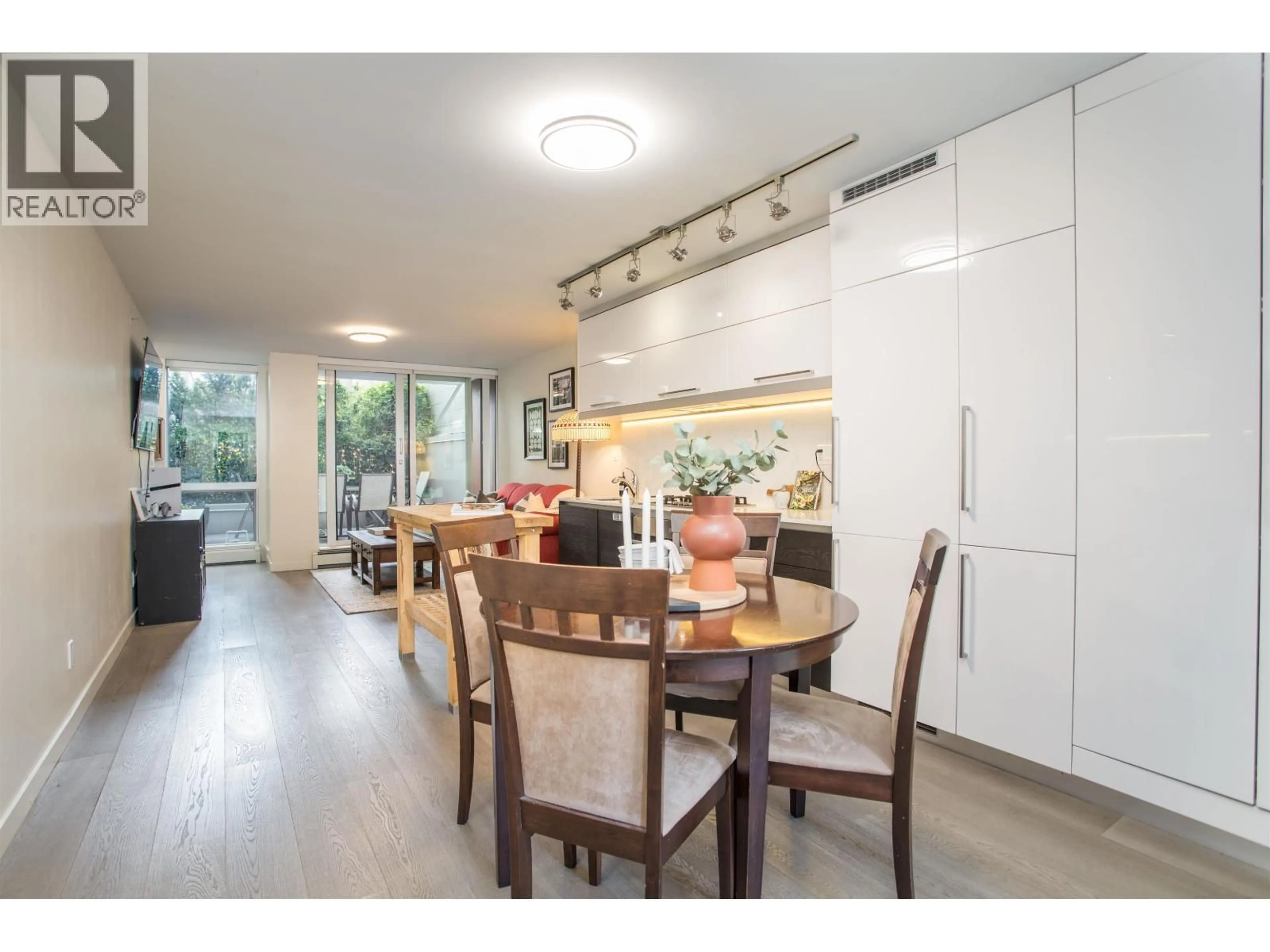 Open concept kitchen, wood/laminate floor for 208 - 189 KEEFER STREET, Vancouver British Columbia V6A0C8