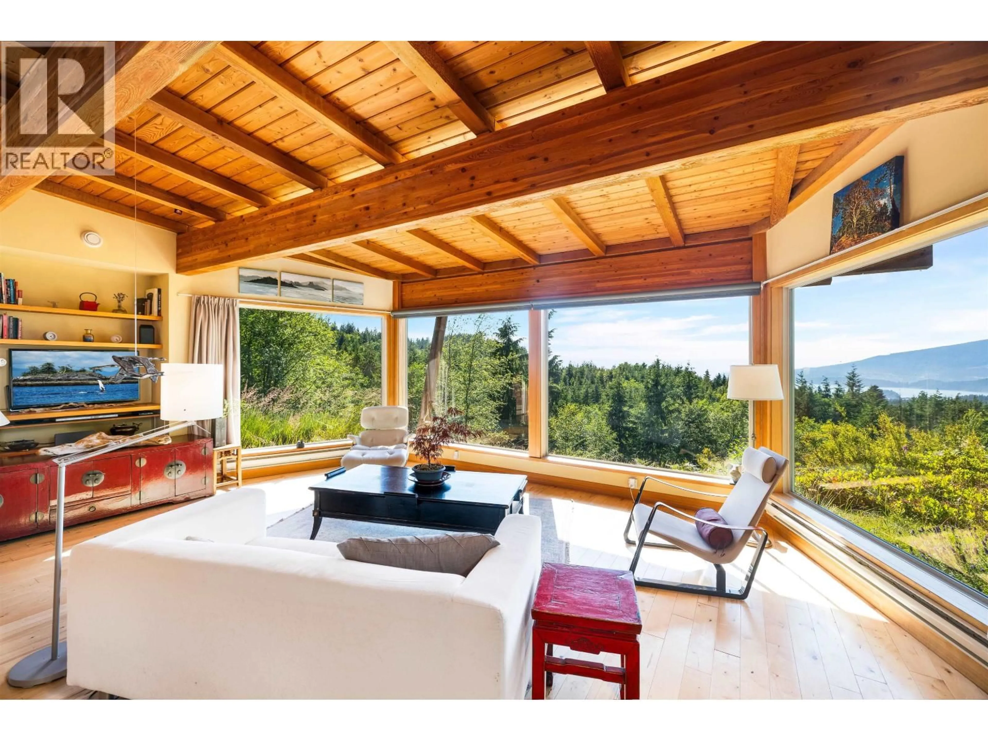Living room with furniture, wood/laminate floor for 1301 SUNSET ROAD, Bowen Island British Columbia V0N1G2