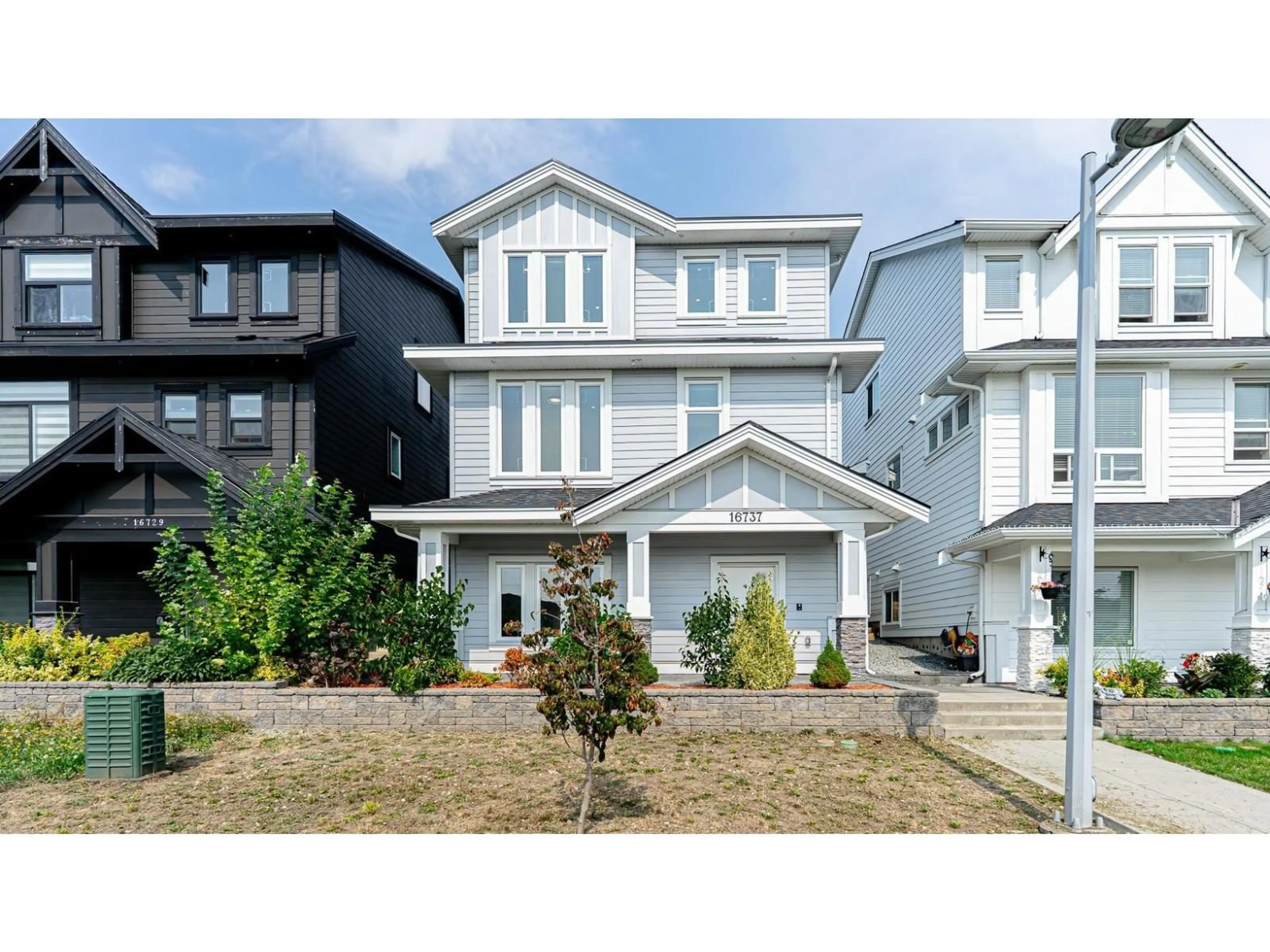 Home with vinyl exterior material, street for 16737 16TH, Surrey British Columbia V3Z0T3